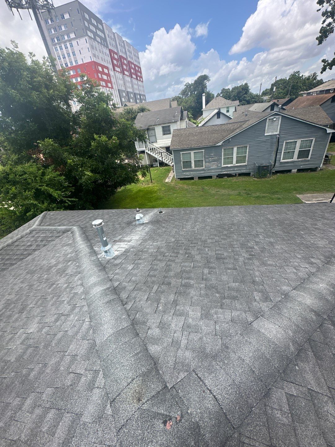 Hail Damage using Owen's Corning Duration (Lifetime) Shingles by Roof Repair Company