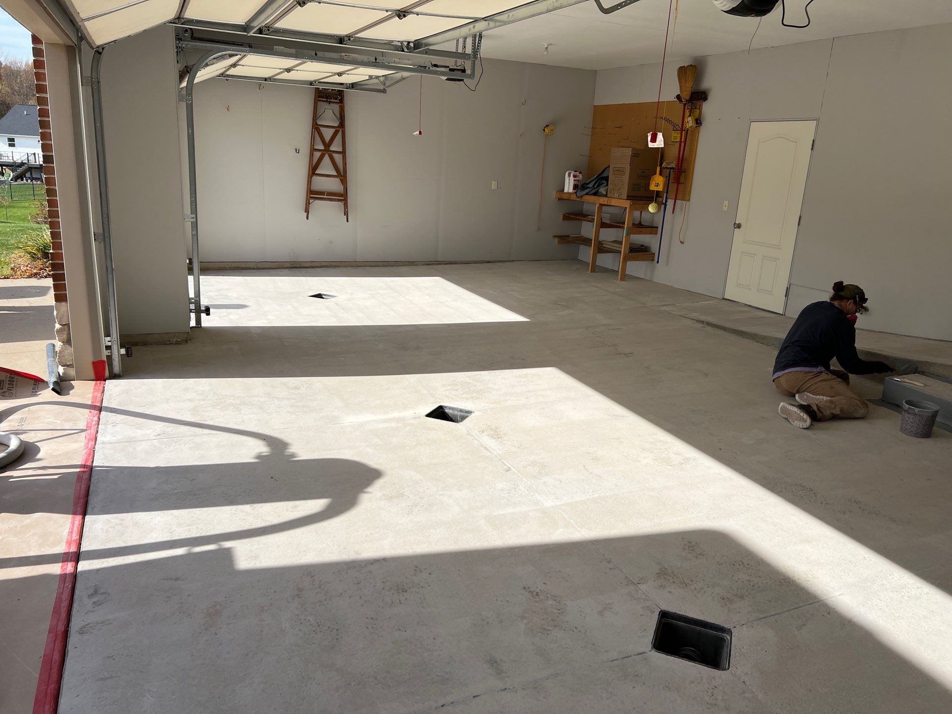 Custom Grey Speckled Epoxy Floor Installation in Grand Rapids by Gordon Painting