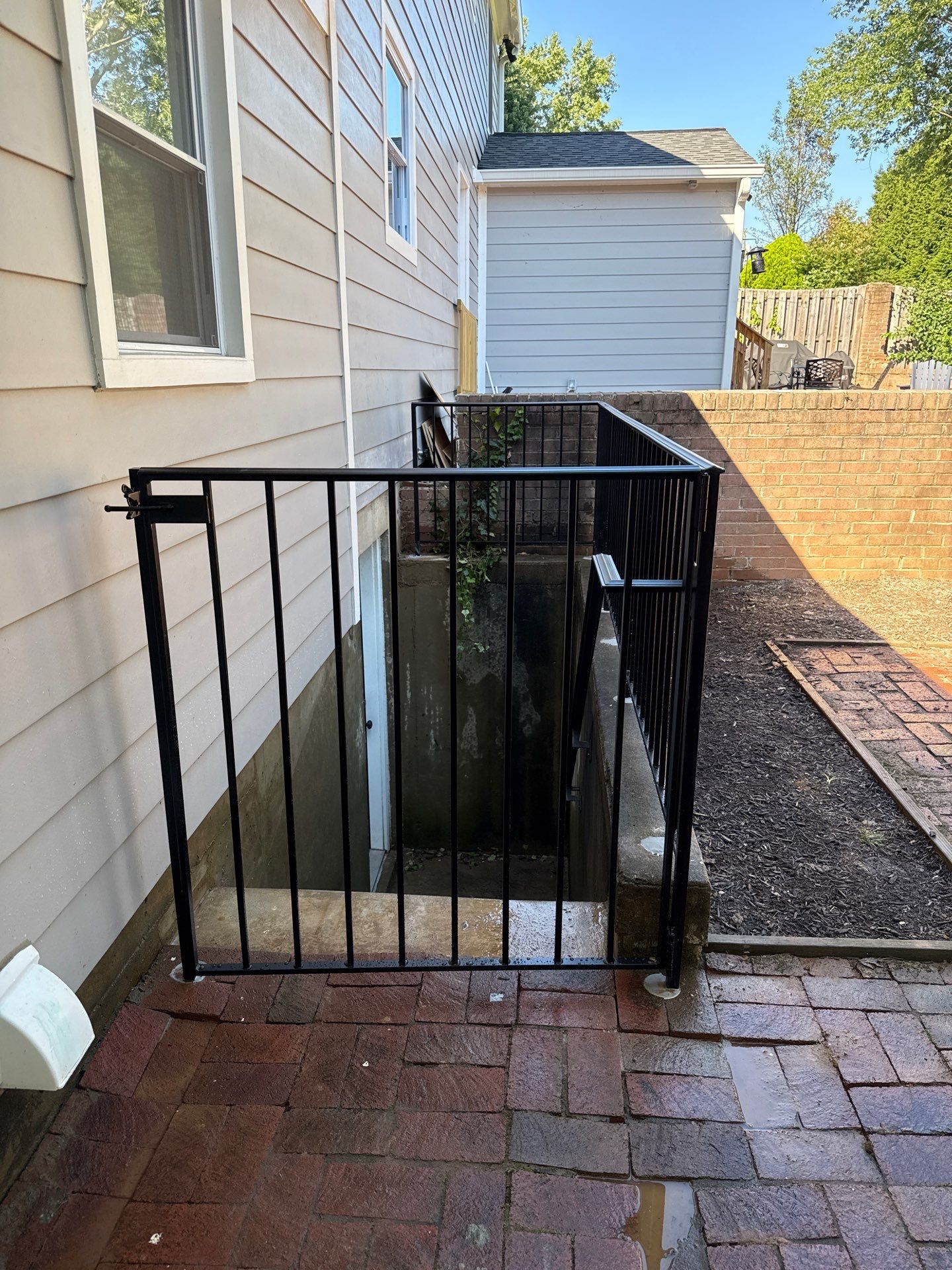 L-Shape Iron Railing & Integrated Safety Gate – Residential Exterior– McLean, VA by Capitol Iron Works