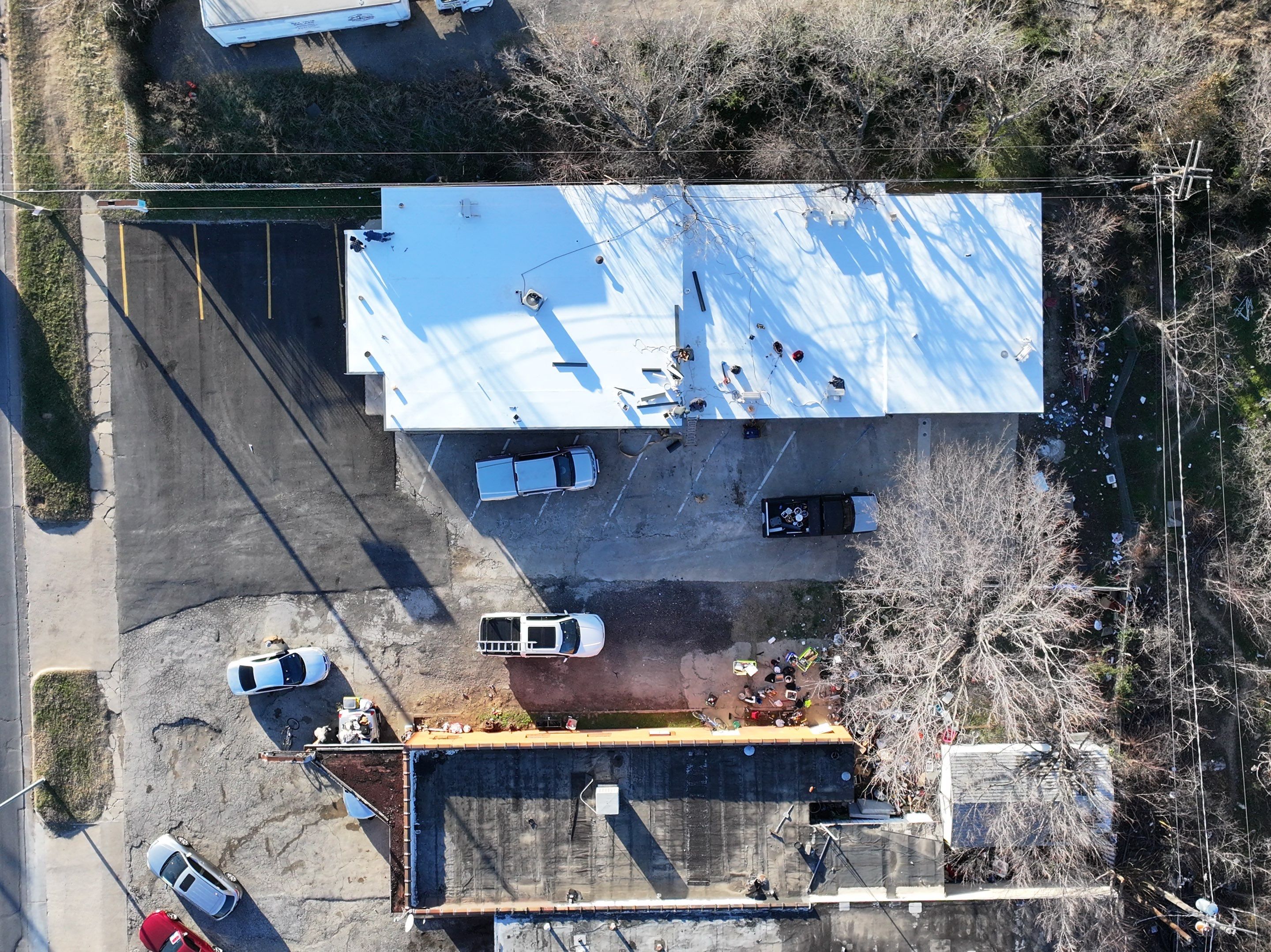Commercial roofing overlay using GAF TPO over an old ballast roof by Becker Roofing and Exteriors