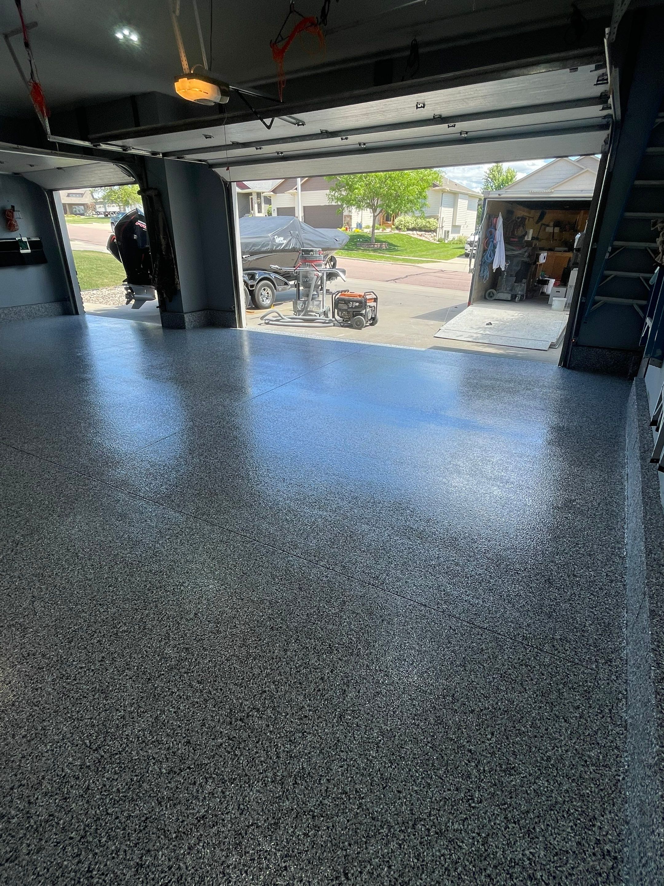 Residential Garage Floor Coating in Sioux Falls by Select Painting, Coatings & Garage Cabinets