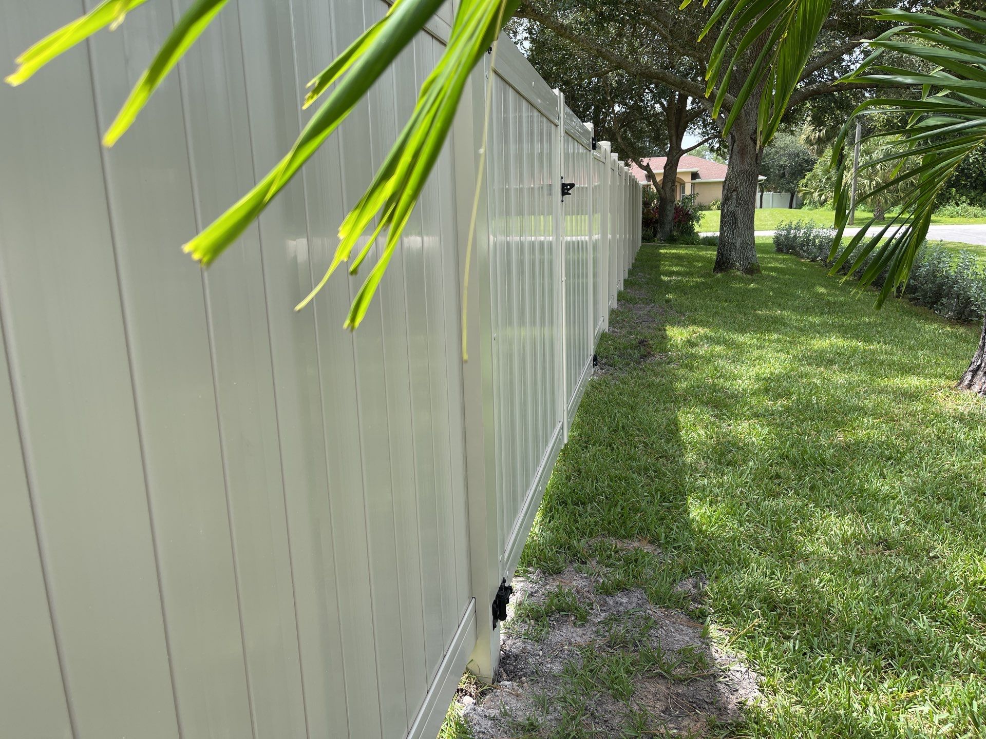 North Port, FL Tan Vinyl Privacy Fence  by Asap fence and gates, LLC