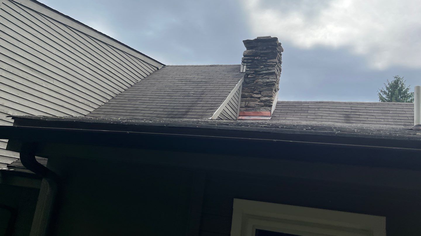 Residential Roofing Installation using Atlas Pinnacle Pristine Black Architectural Shingles by Frederick Roof Repair