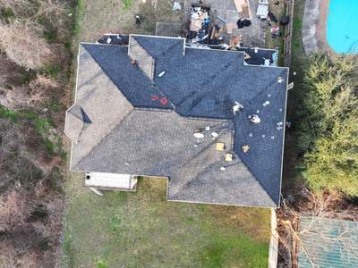Storm-Damaged Roof Rebuilt, Deck Repairs Included — Houston, TX