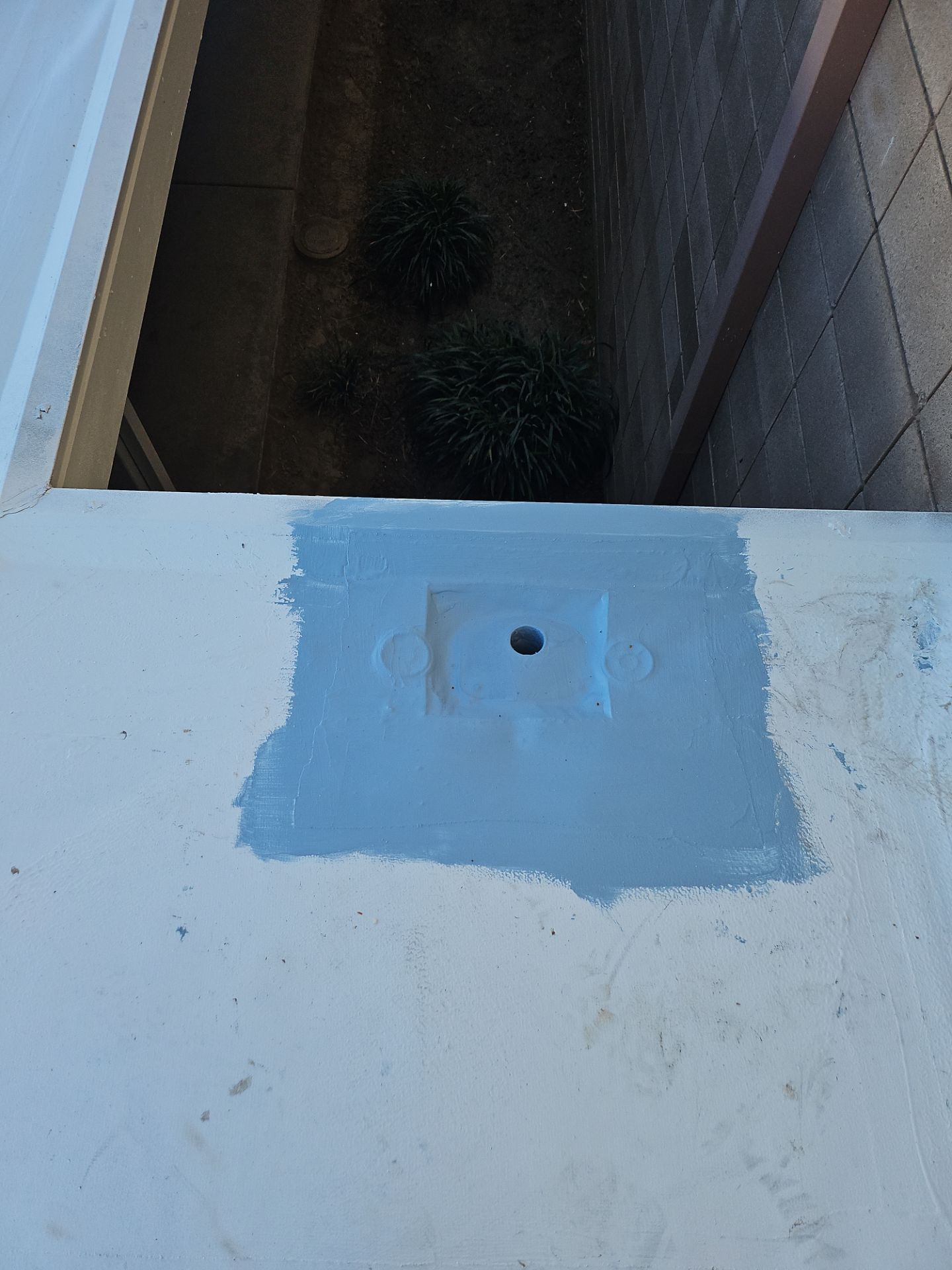 Single-ply restoration system using Benchmark/PUMA XL coatings over TPO single-ply roofing by Straight Edge Roofing Inc