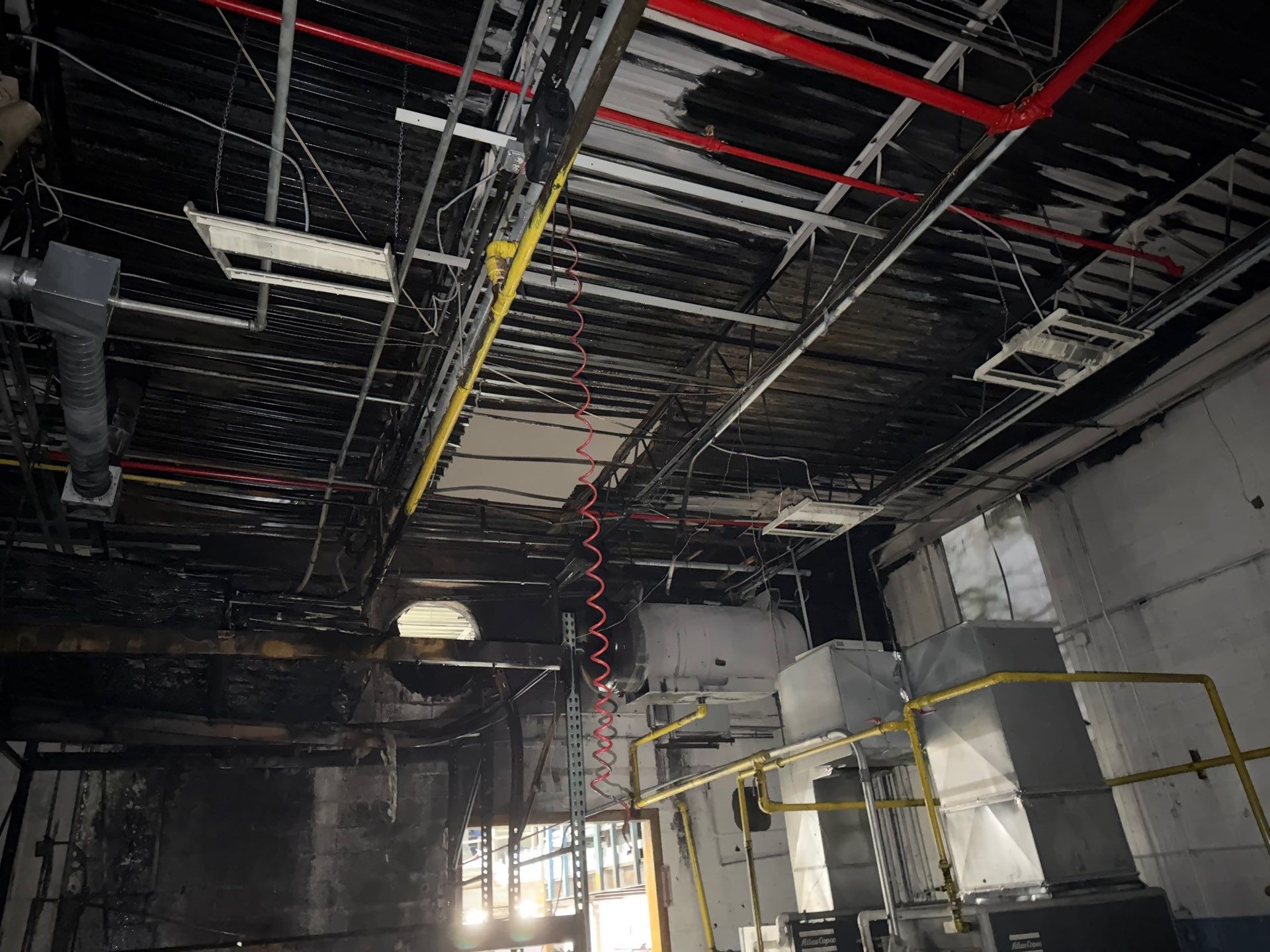 Industrial Warehouse Fire Damage Cleaning and Spray Sealing in Islandia by EMS Restoration Corp