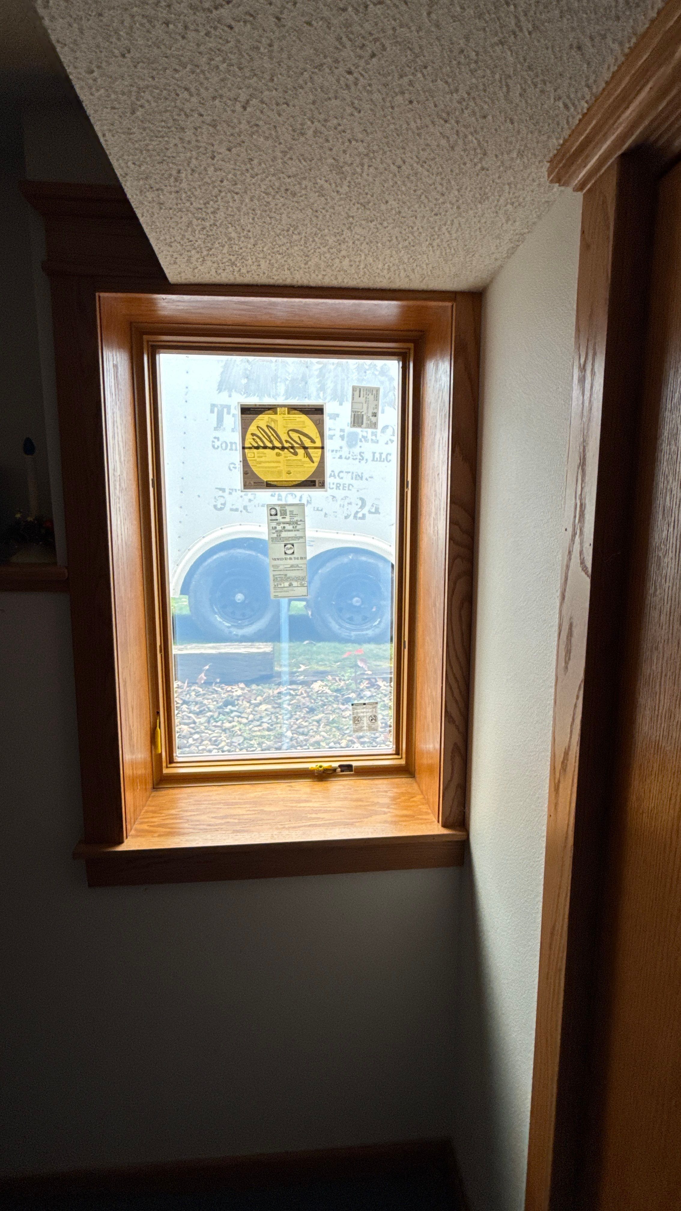 A Clean Window Upgrade Ready for New Siding with Pella Lifestyle Series by United Windows and Siding LLC