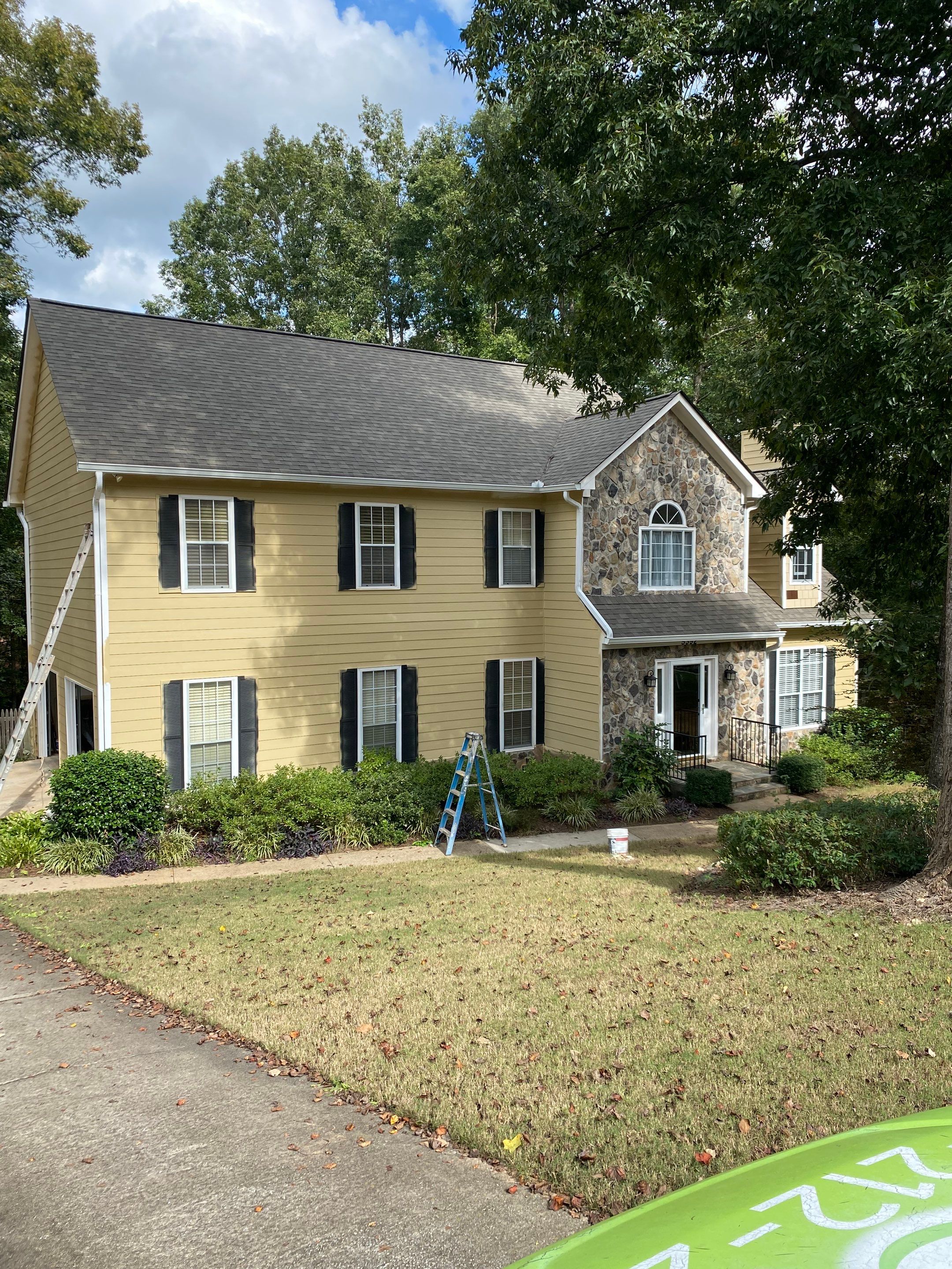 Full Exterior House Painting for Suburban Residence in Douglasville by Swift Home Renovations