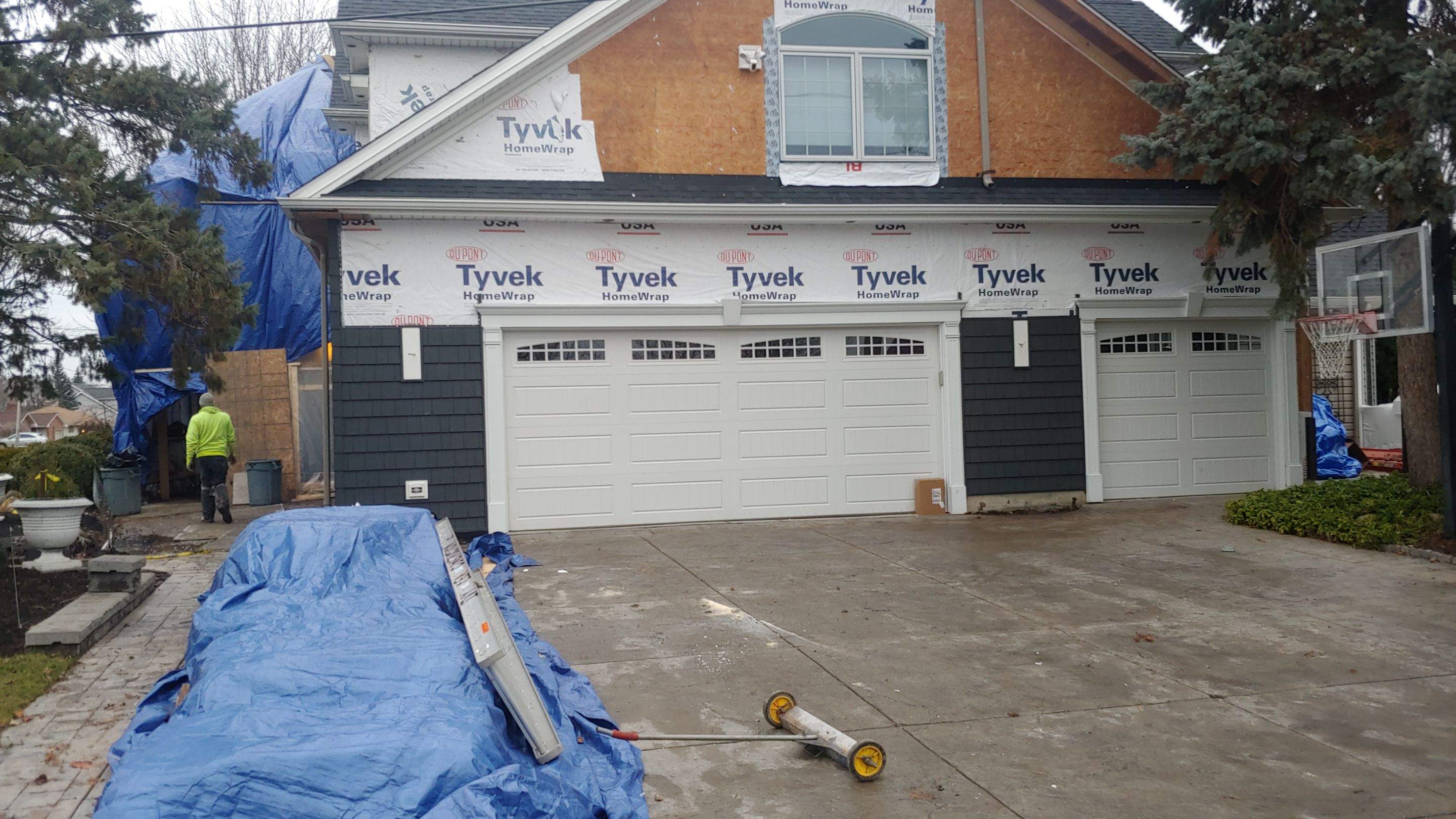 Exterior Renovations- Siding, Concrete, Railings, and Entry Door  by Ivy Lea Construction