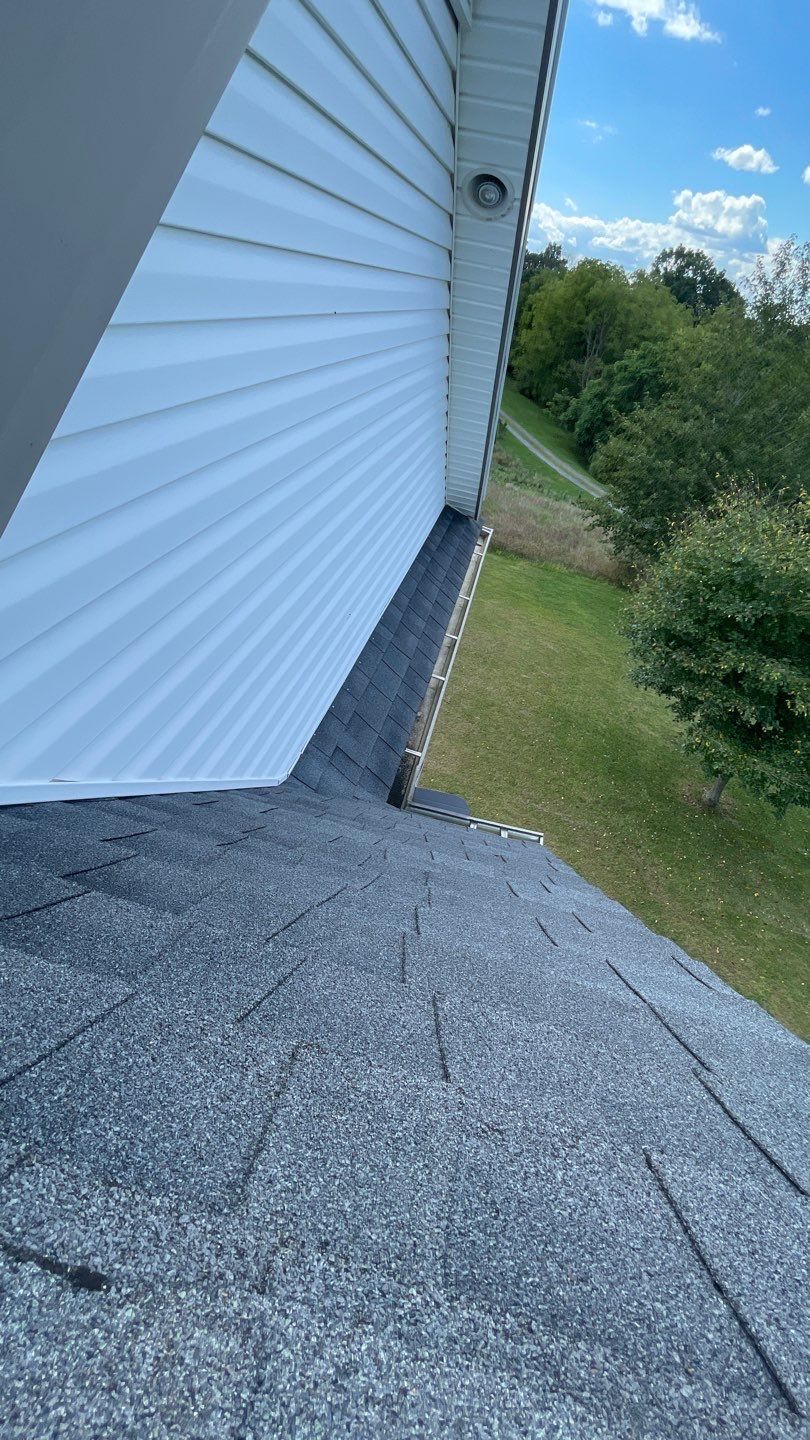 Roof Damage using Certainteed Lifetime Roofing System- Moire Black Landmark Pro shingkes with shadow ridge caps. by BulletpROOF Exteriors