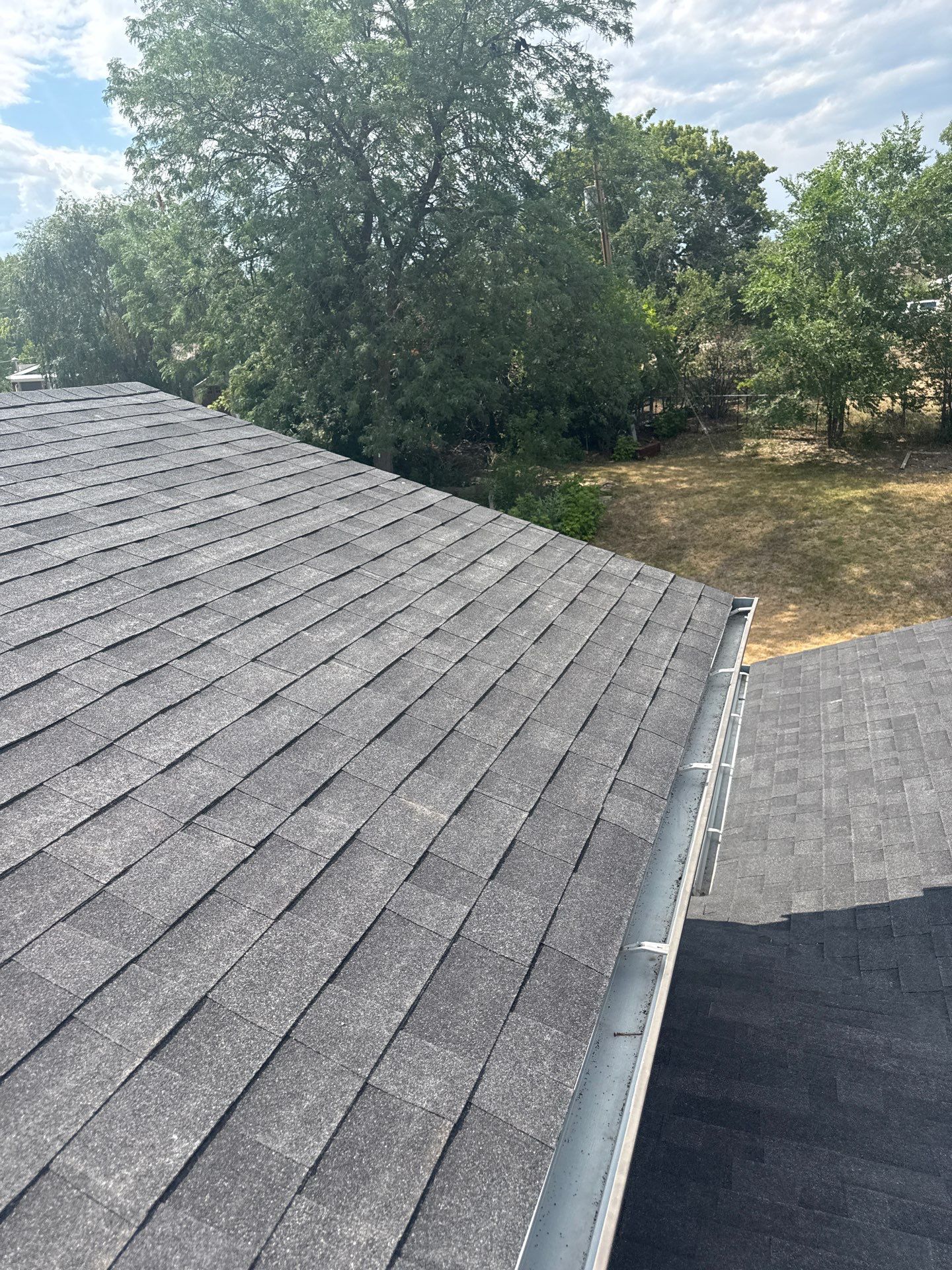 Full Architectural Shingle Roof Replacement and Gutter Installation in Rapid City by Weather-Tite Exteriors LLC