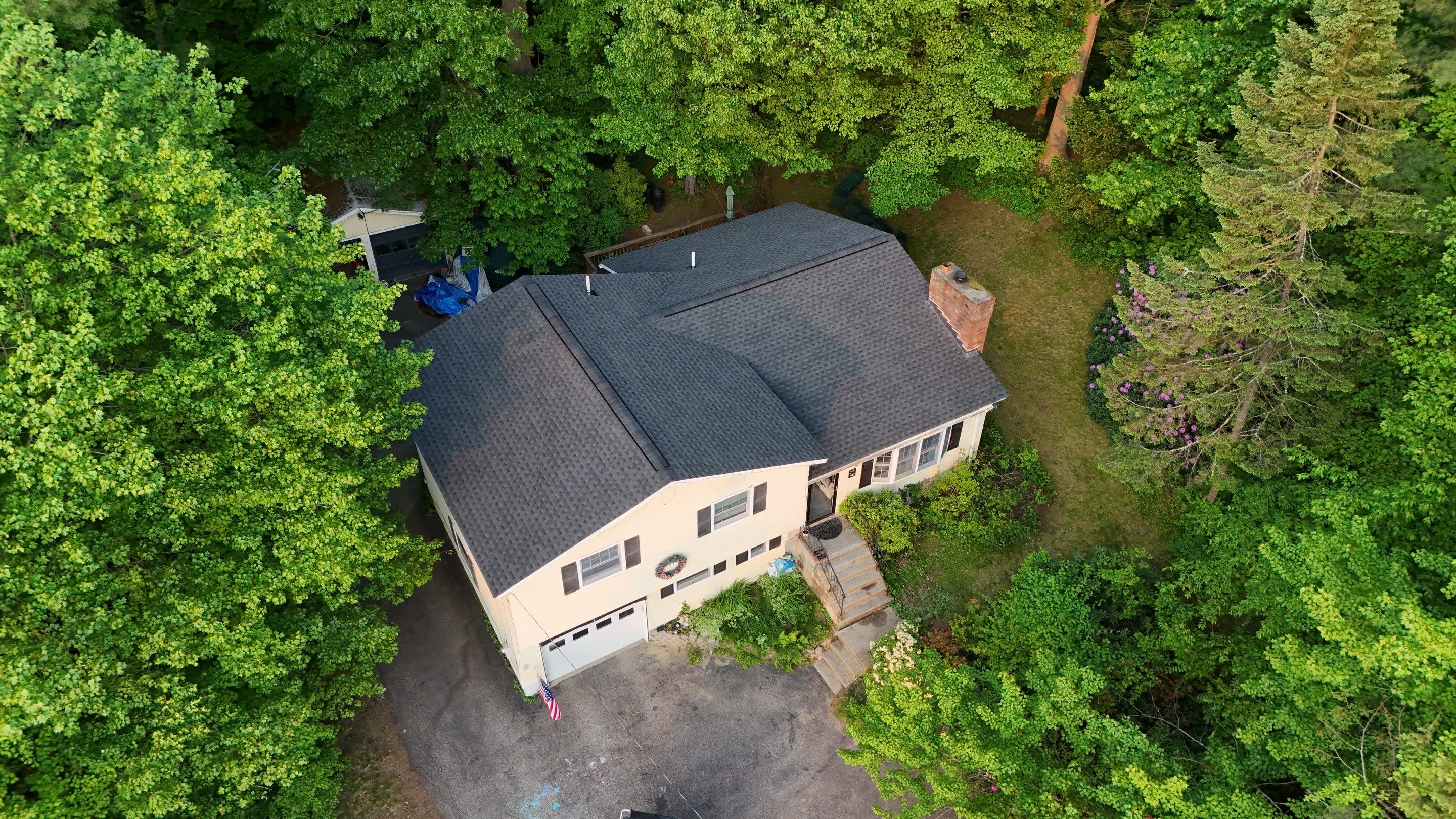 Project in Hooksett by Zhumas Roofing & Exterior