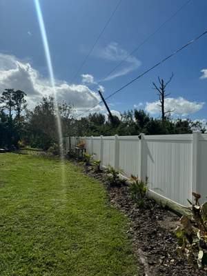White Vinyl Privacy Fence Installation in Port Charlotte