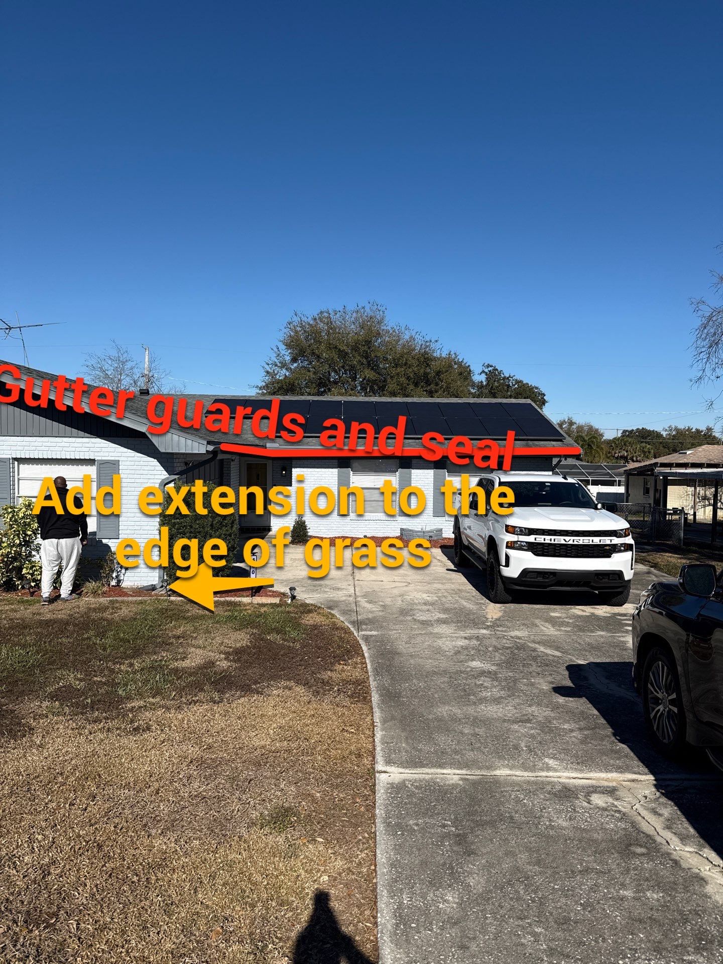 Downspout Installation using Downspout Extension and new Gutters in Winter Haven FL by Gutter Professors