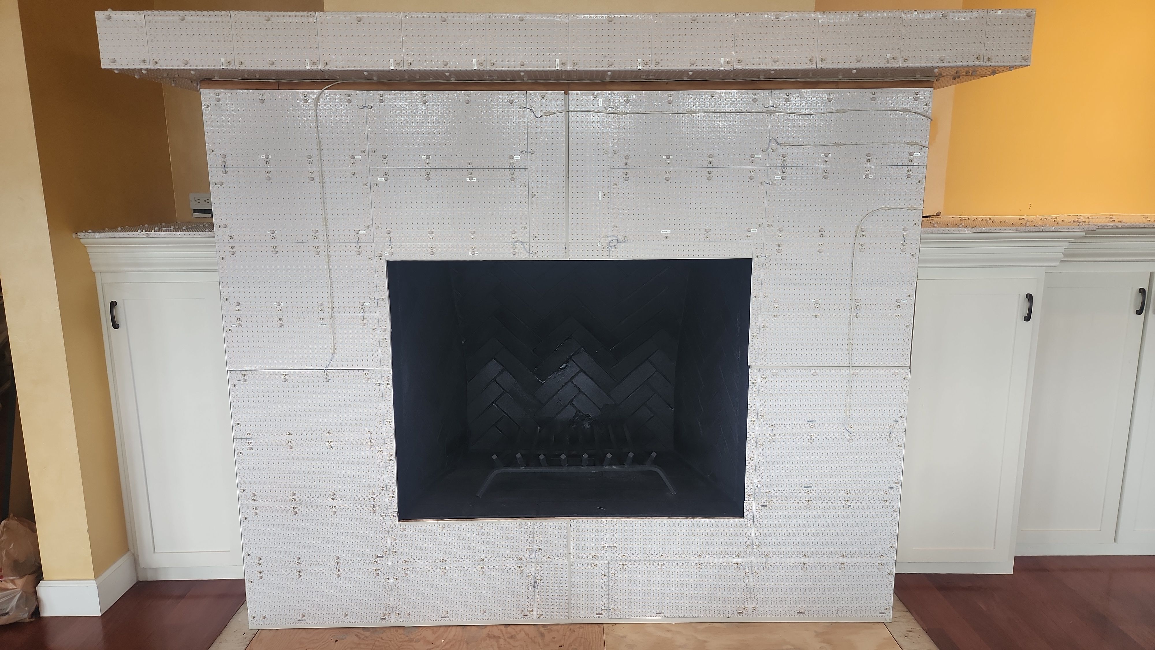 Backlit Stone On A Fireplace by S.Y. Electric Inc.