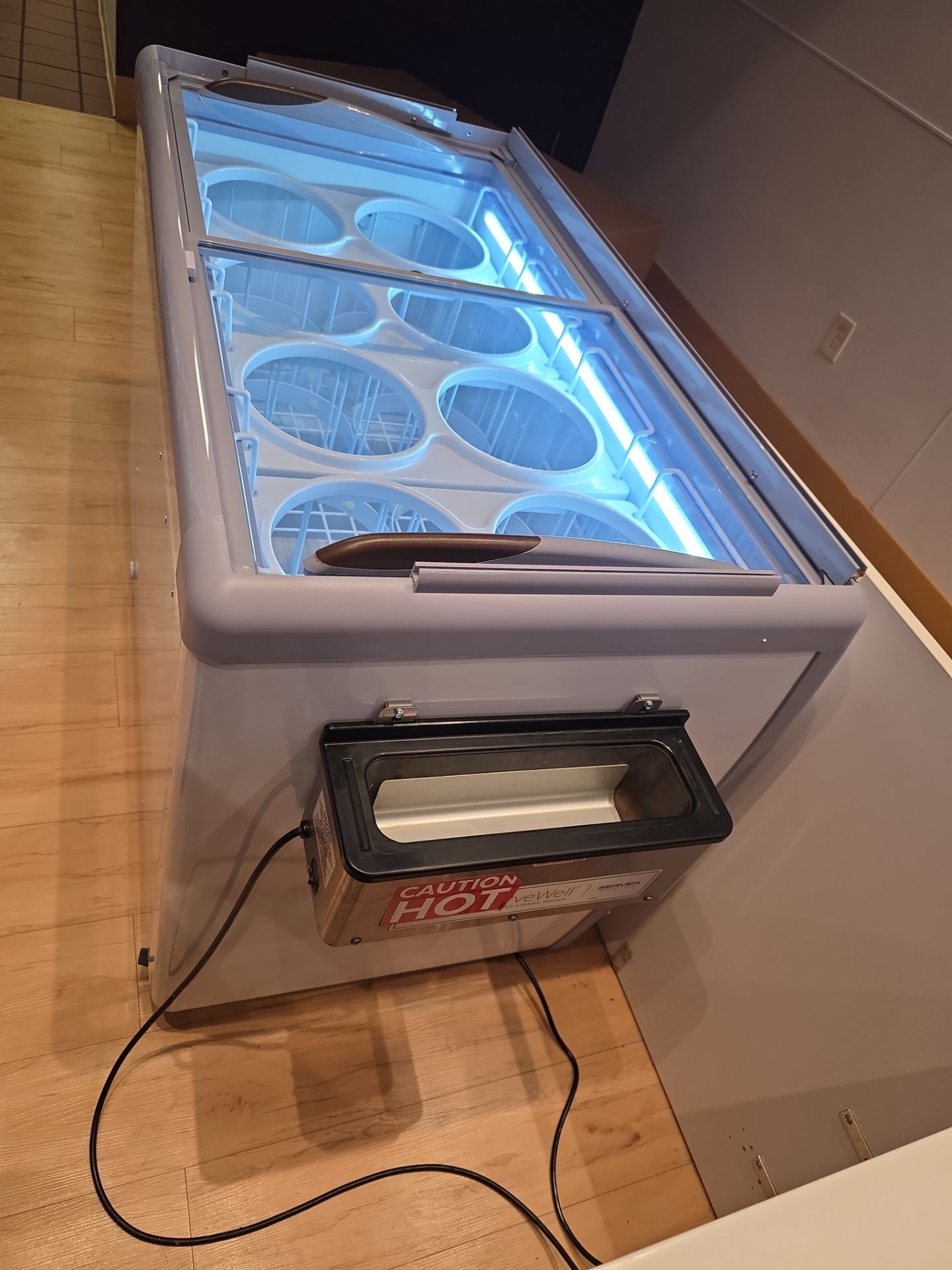 Commercial Ice Cream Dipping Cabinet Installation in Orlando by AMB-WORKS APPLIANCE REPAIR
