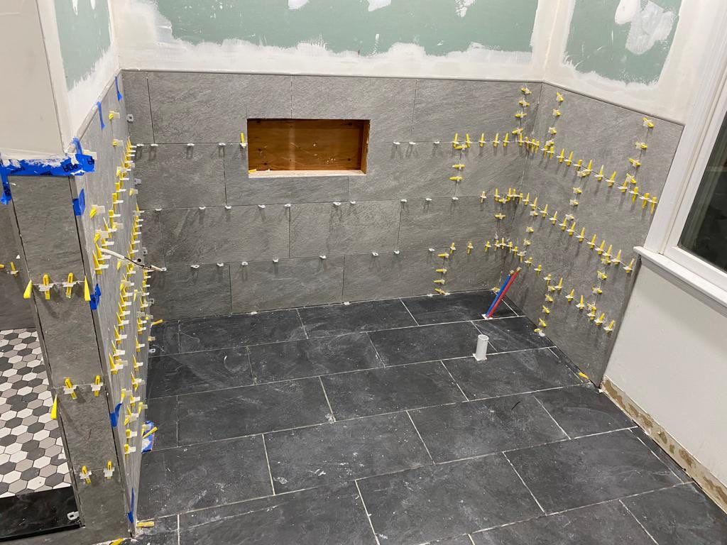 Bathroom Remodel using Tile by Home Concepts Construction