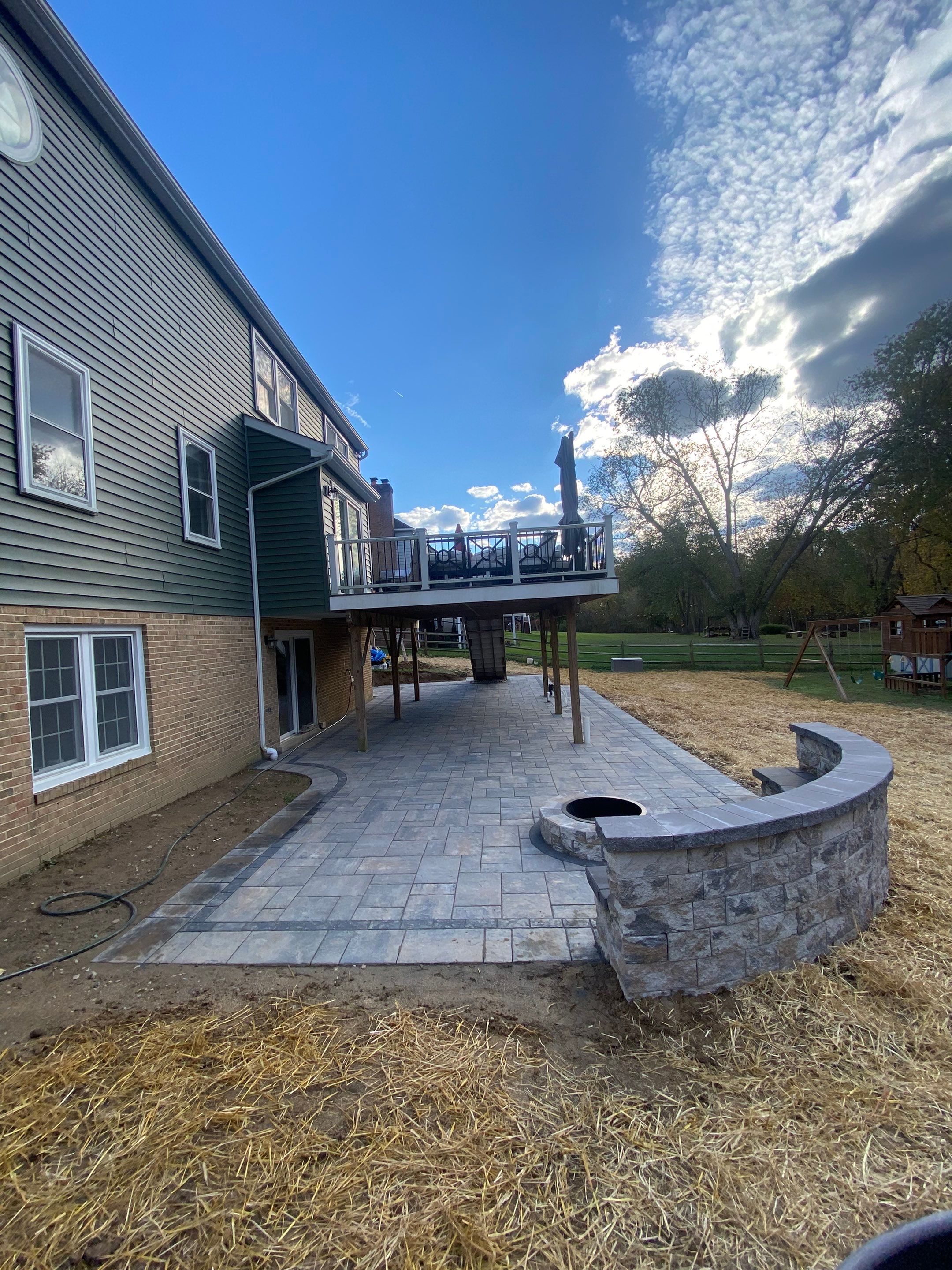 Backyard Transformation using Techo-Bloc Pavers by The Smet Companies, LLC
