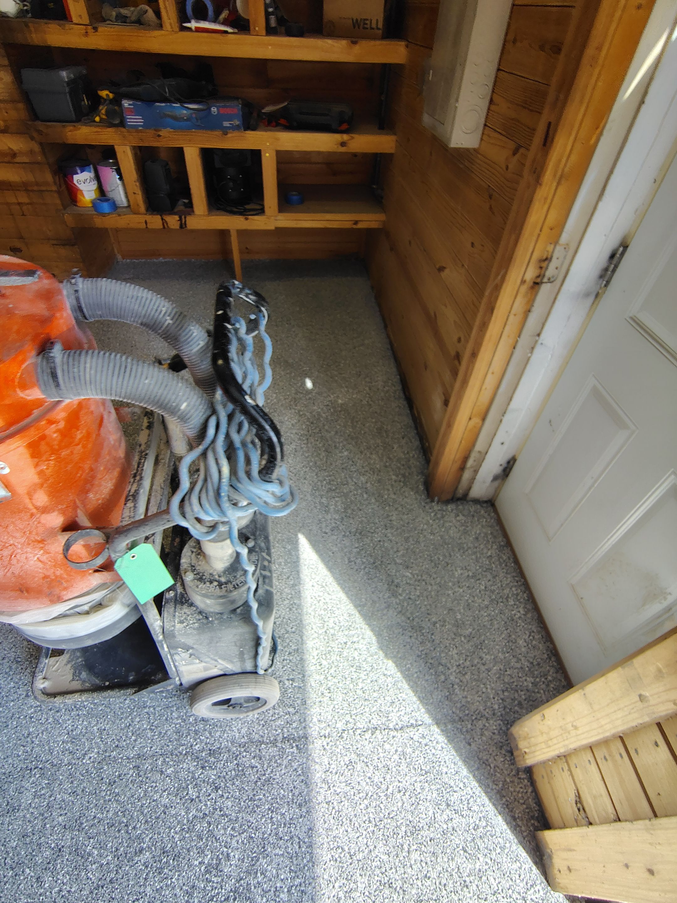 Commercial Epoxy Flake Floor Coating in Emmetsburg, Iowa by Select Painting, Coatings & Garage Cabinets