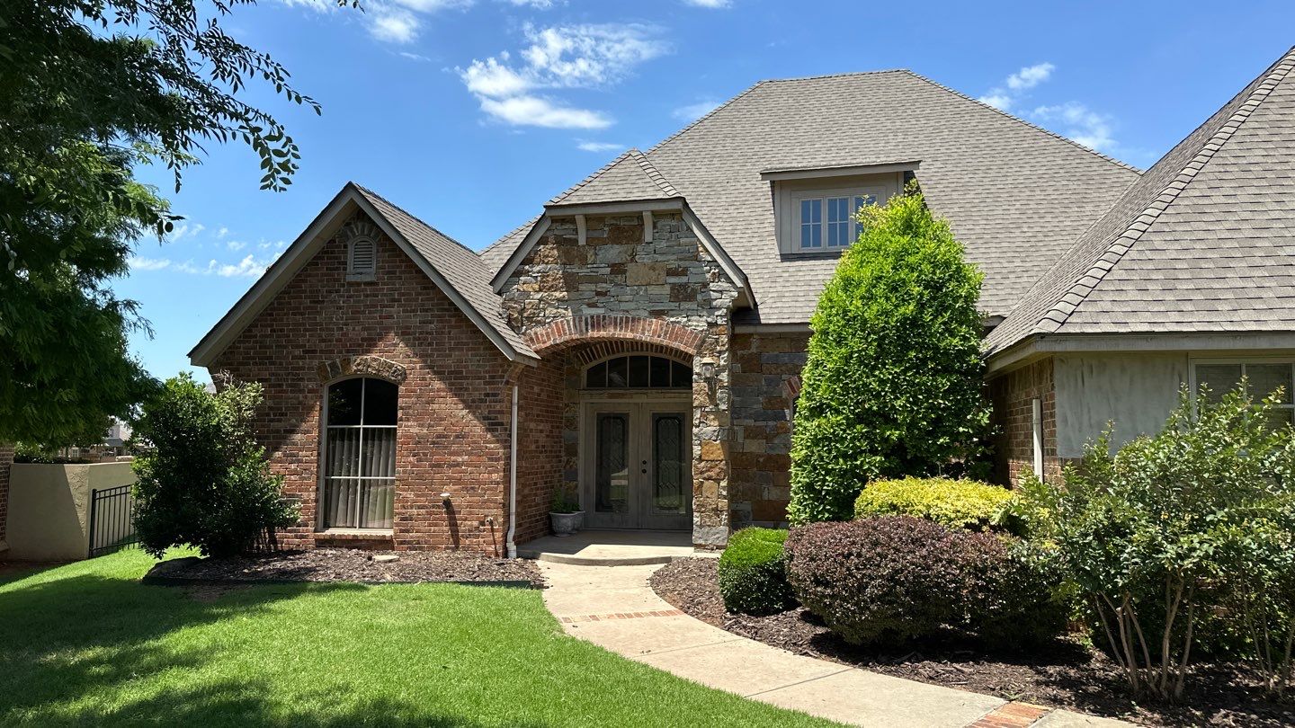 Roof Replacement and Gutter Installation in Edmond, OK by McCann's Roofing and Construction