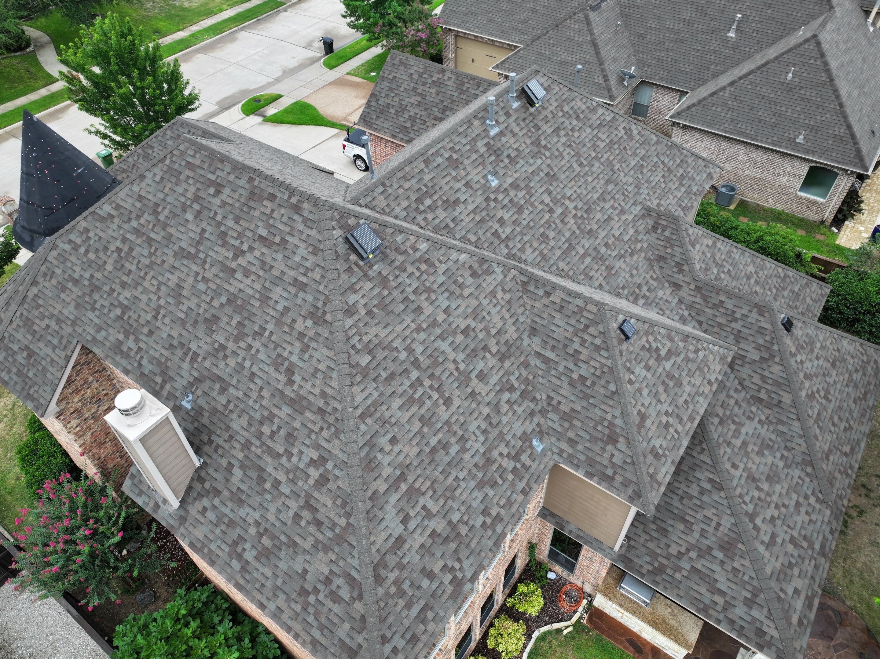 Installing Custom copper turret and Malarkey Vista Class 4 shingles Hail Damage Upgrade by Becker Roofing and Exteriors
