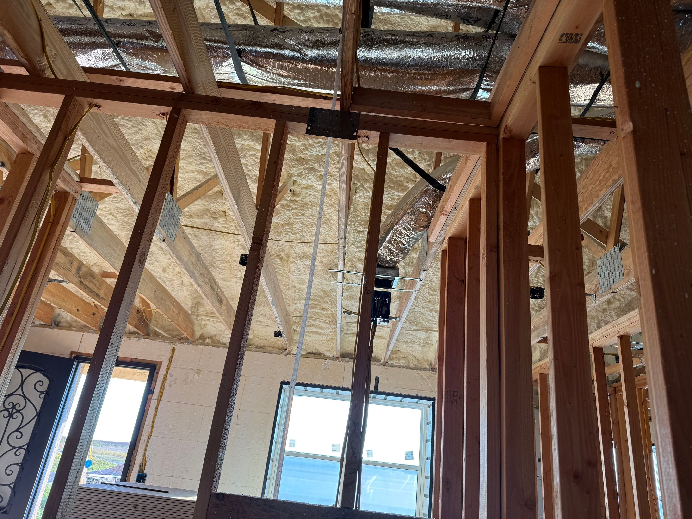 Hybrid foam system on roof deck of ICF house by Kool Foam LLC