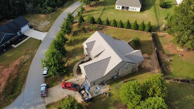 Insurance Covered Full Replacement with Atlas 25 Year Labor & 50 Year Manufacture Warranty