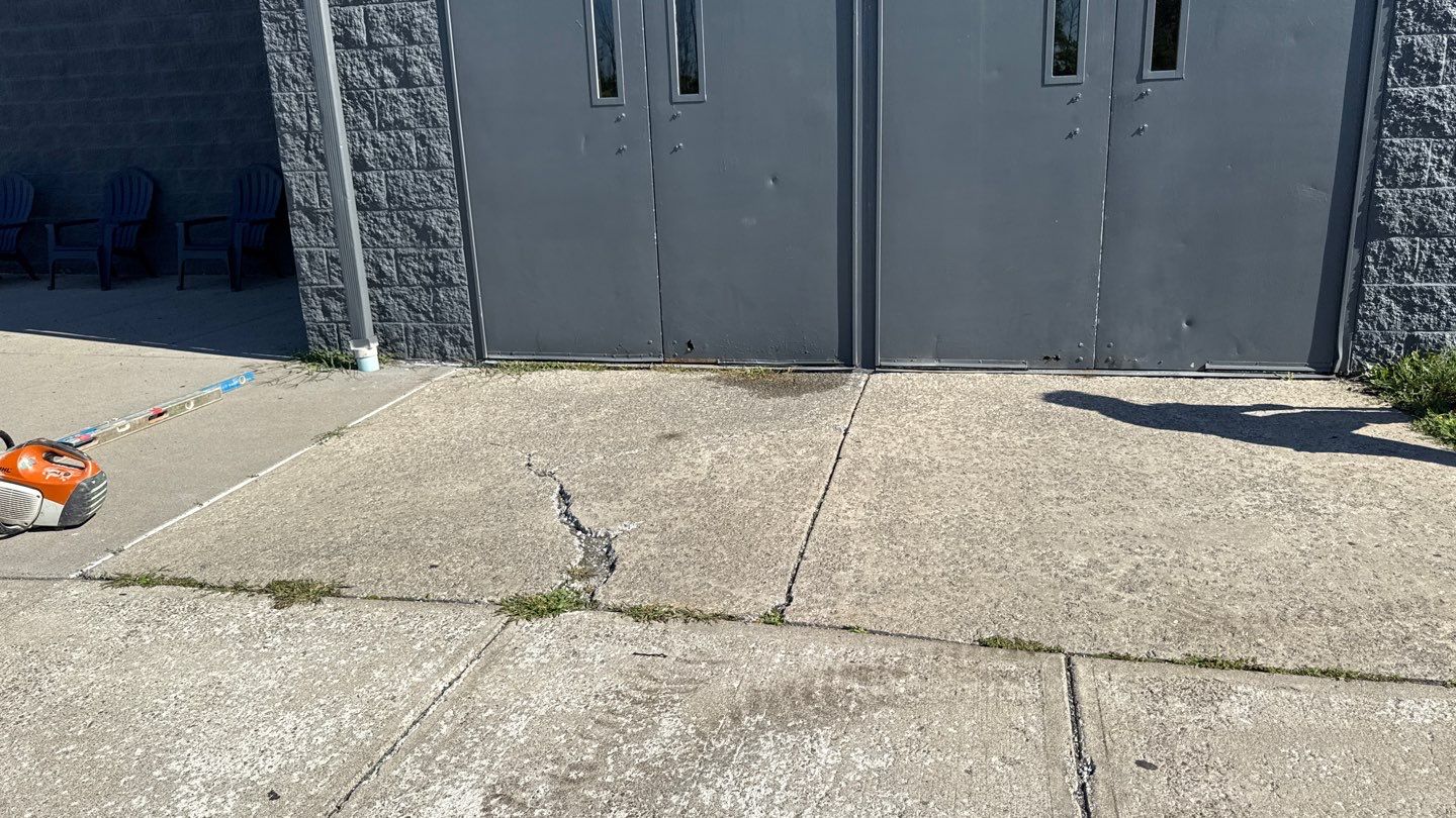 Broom finished concrete patio  by NG Masonry & Construction LLC