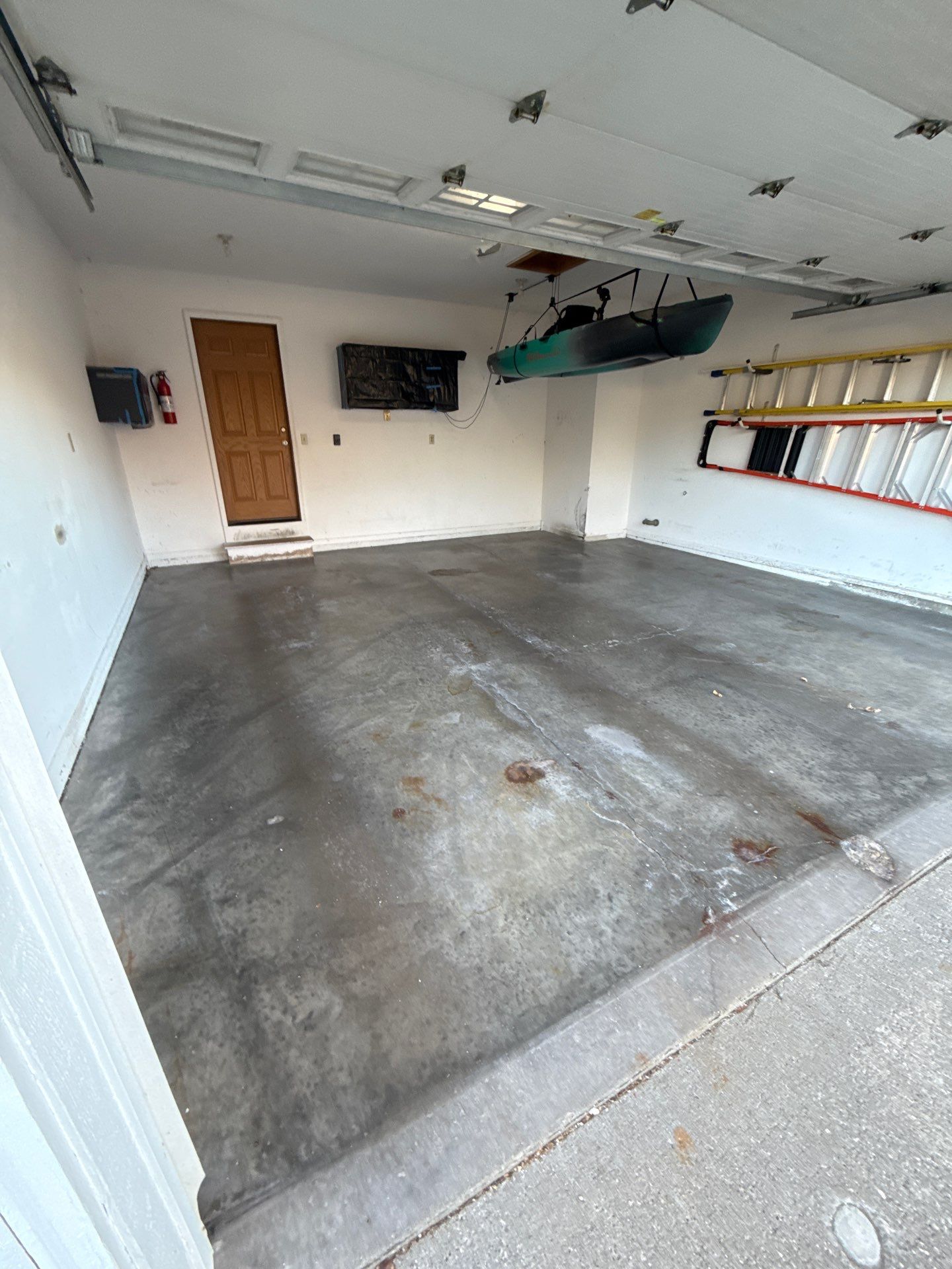 38 Year Old Garage Looking Brand New! by Revival Concrete Coatings, LLC