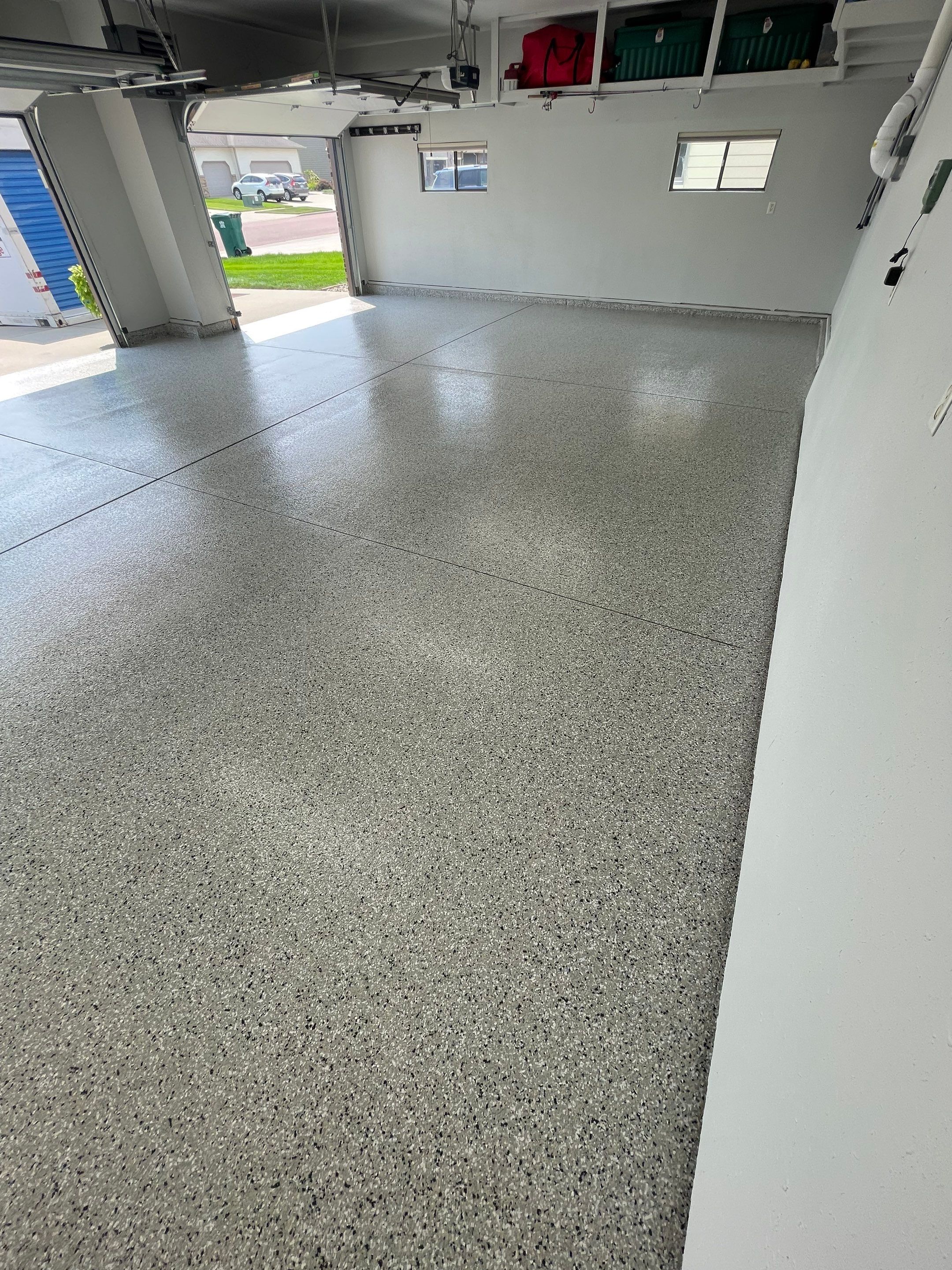 Multi-Car Garage Floor Coating and Crack Repair in Tea by Select Painting, Coatings & Garage Cabinets