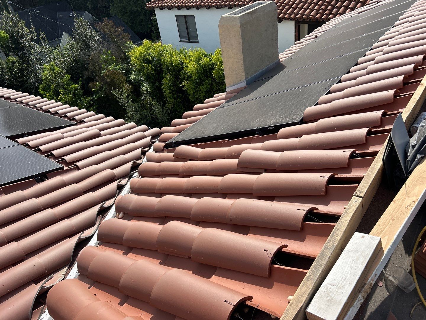 Spanish-Style Roof Replacement with Integrated Solar in Altadena by Reliable Roofing San Diego Inc.