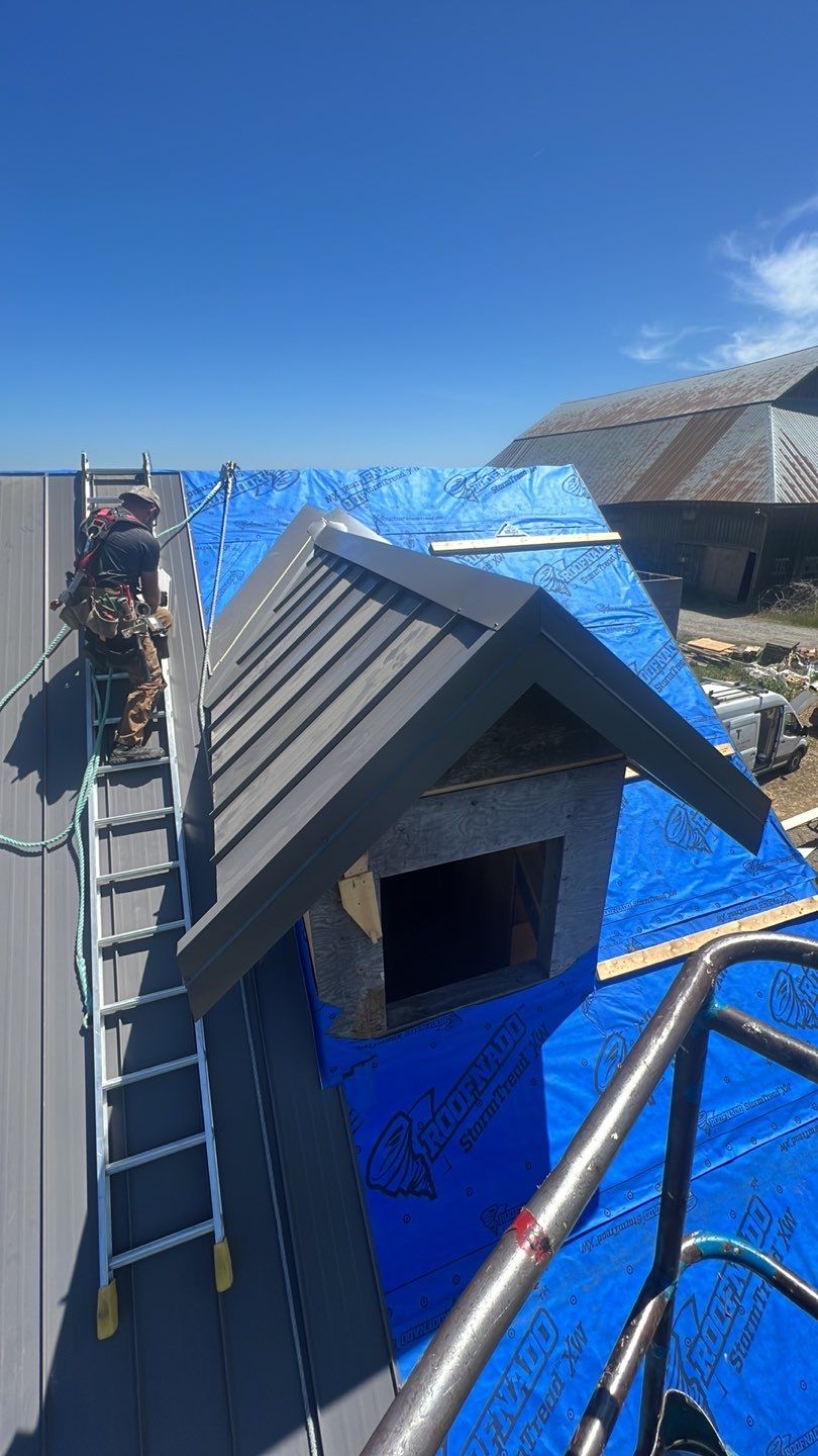 Agricultural Roofing Installation using 12" Prolok metal  by Top Notch Roofing Inc