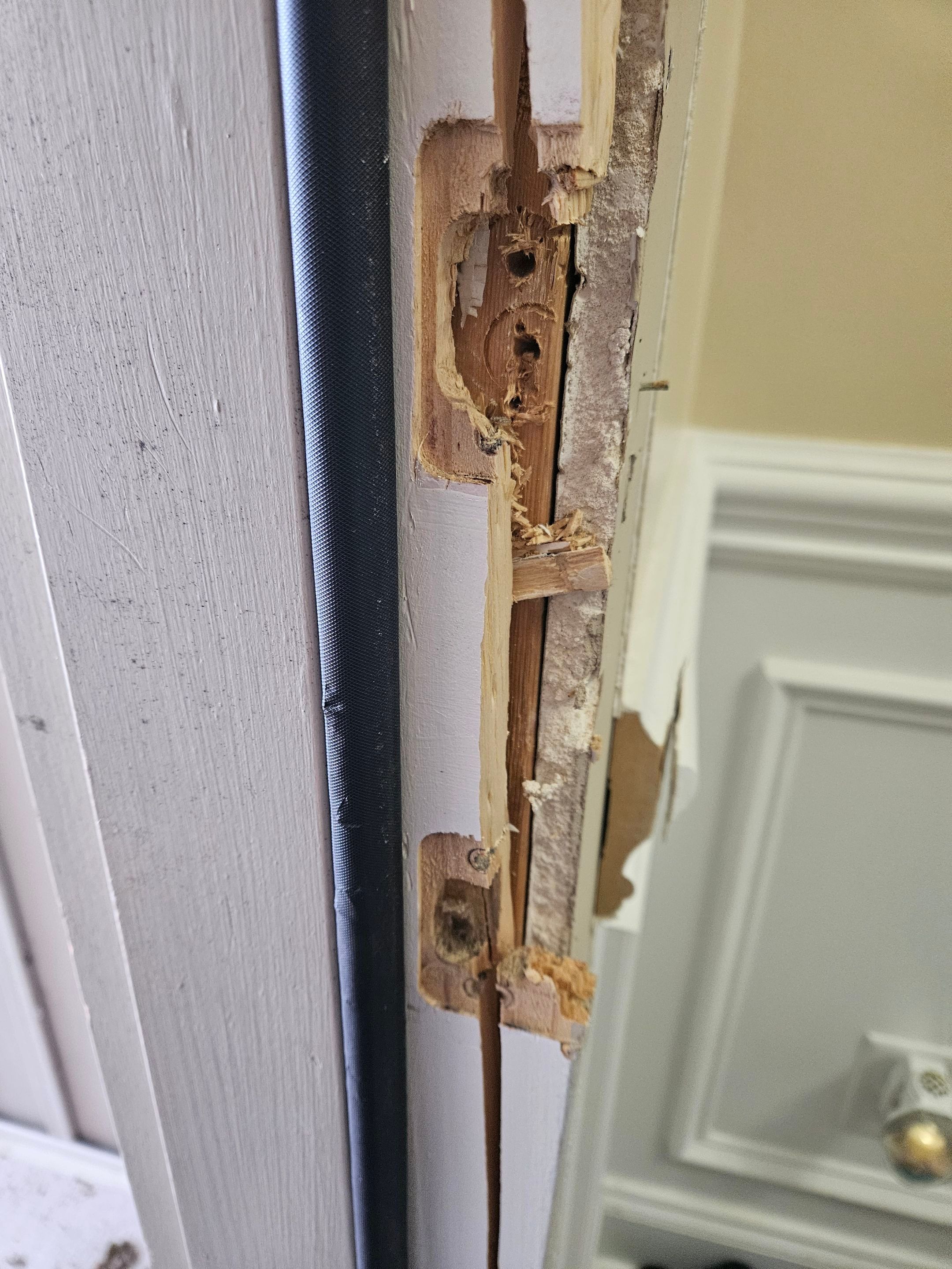 Drywall/door/frame repair and towel hanger installation by Swift Signings and Services LLC