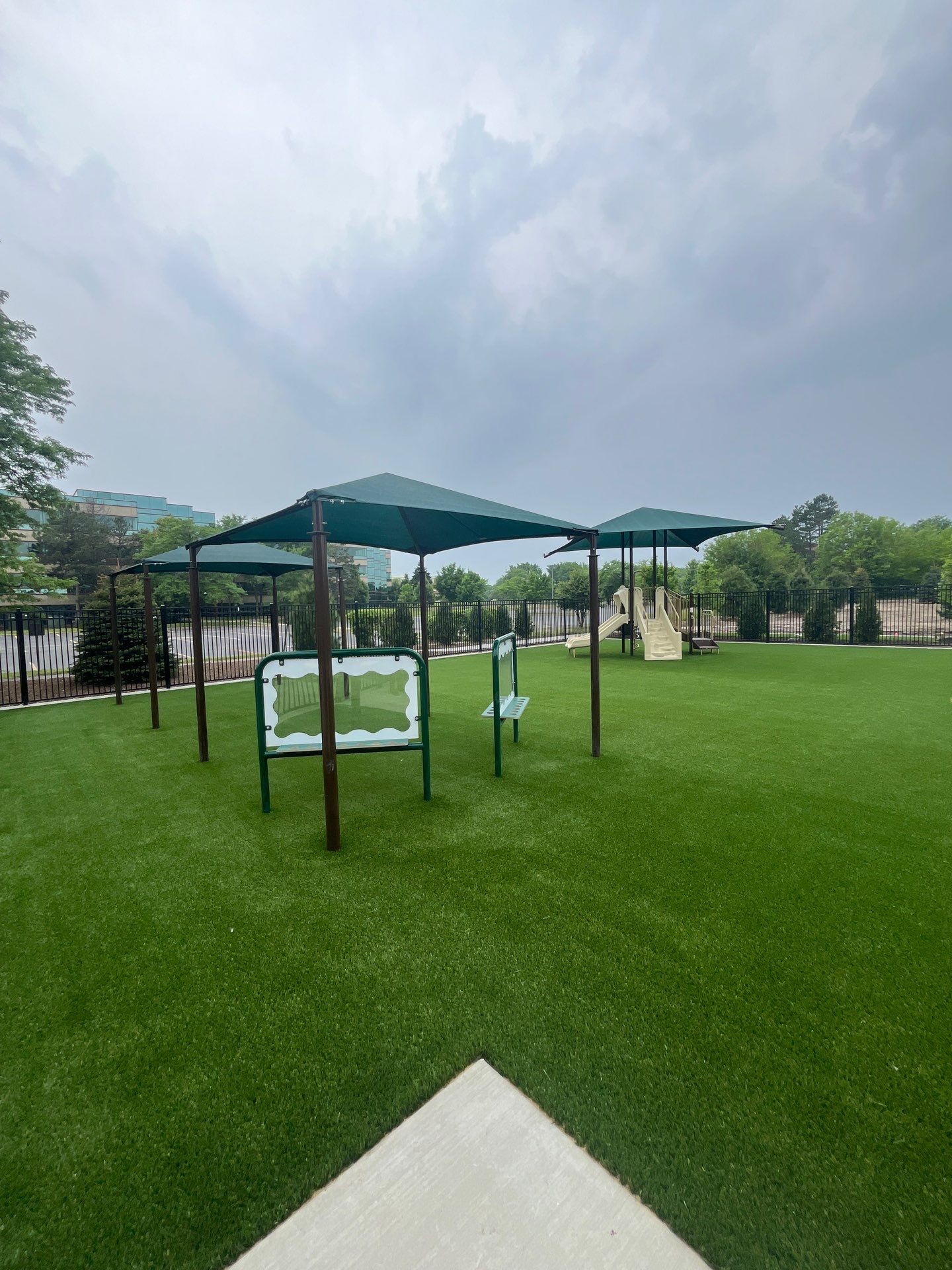 KinderCare of Lincolnshire Commercial Playground Turf Installation by Southwest Greens Midwest