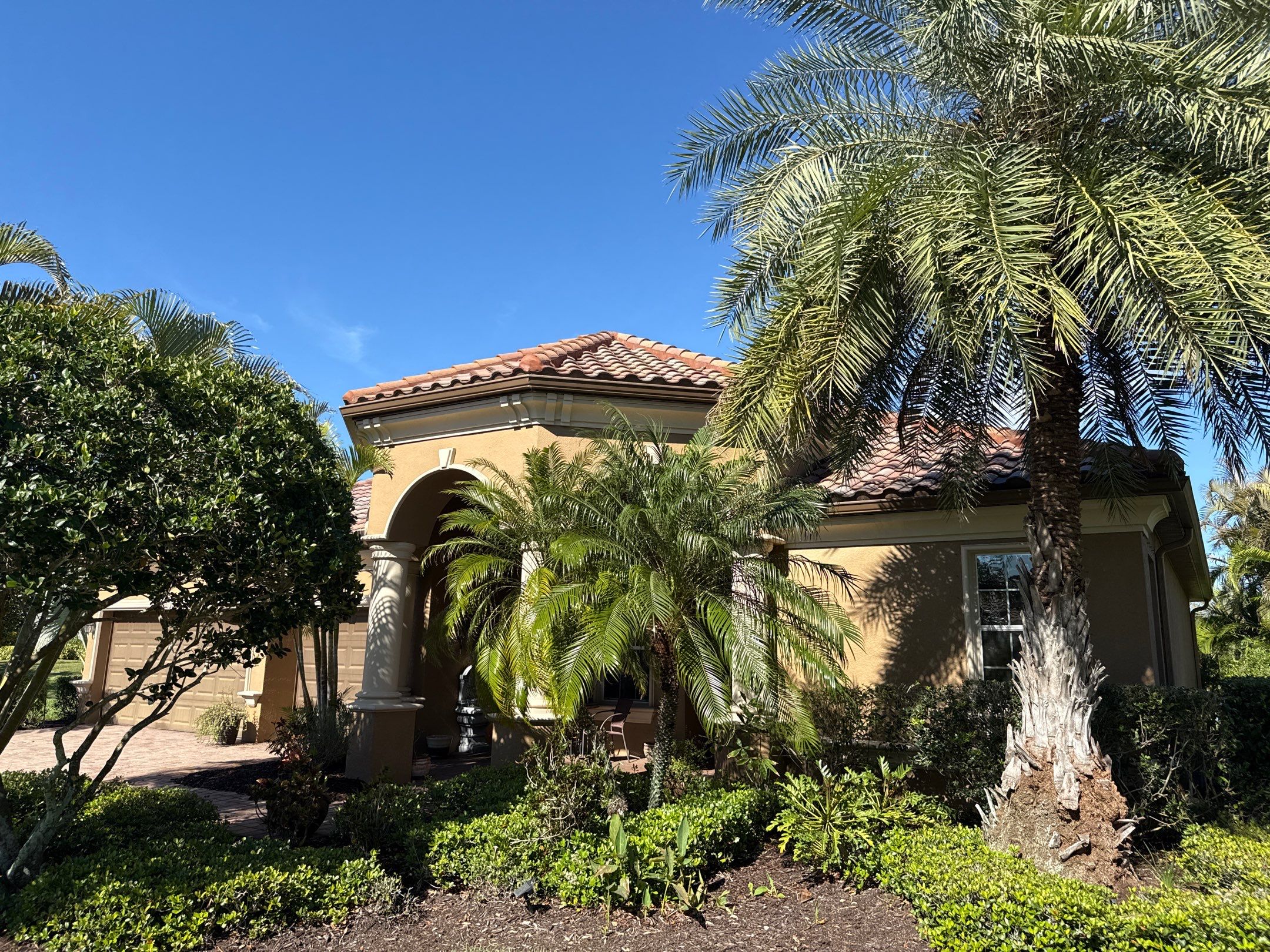 This project focused on a full gutter clean-out to restore proper water flow and prevent overflow issues.  Our scope of work included: 	•	Removing heavy leaf and pollen buildup from the gutter system 	•	Clearing out clogged sections along the rear gutters near the pool cage, where debris tends to accumulate more heavily 	•	Inspecting and cleaning the front gutter guards, which had several blocked areas restricting water flow 	•	Ensuring all downspouts and channels were flowing properly after service  Even with gutter guards installed, debris like pollen, shingle grit, and fine organic matter can still build up over time—especially in Florida’s environment. Regular maintenance helps prevent water damage, overflow, and staining on exterior surfaces.  Another thorough job completed by Sunshine AquaWash® – keeping homes protected from top to bottom. by Sunshine AquaWash