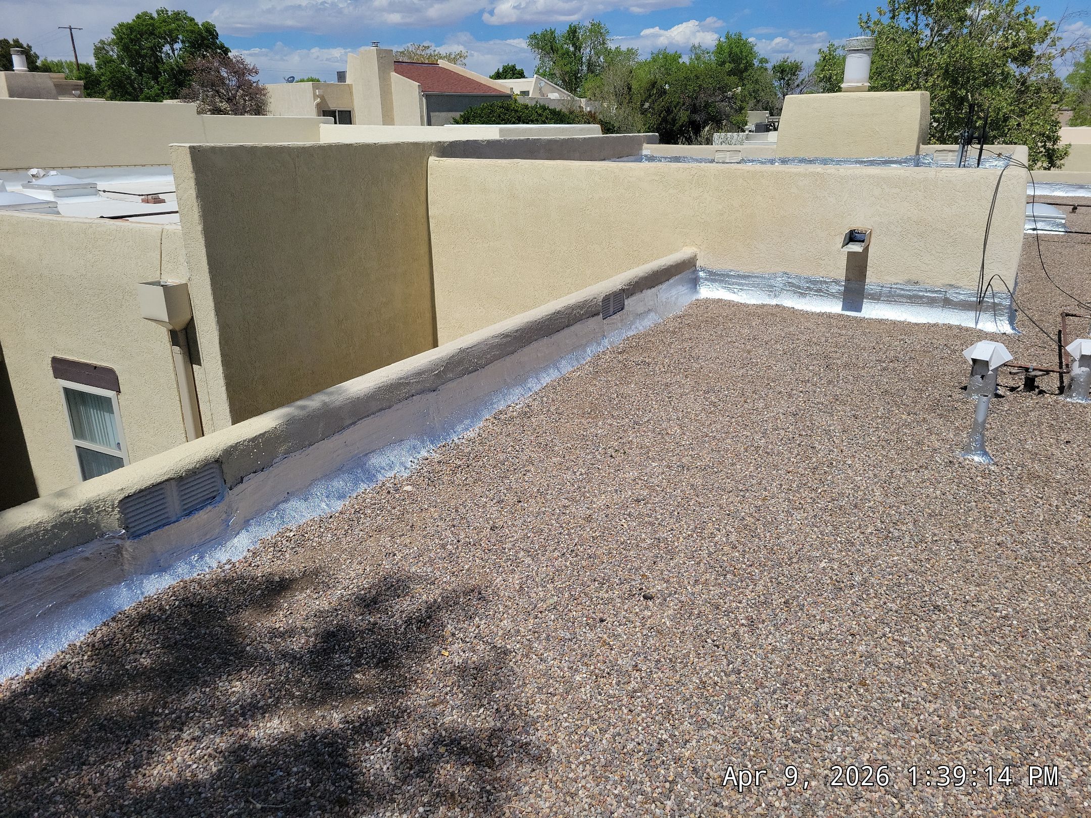 Tar and Gravel Roof Maintenance and Skylight Sealing in Rio Rancho by Doyle Roof Masters Inc
