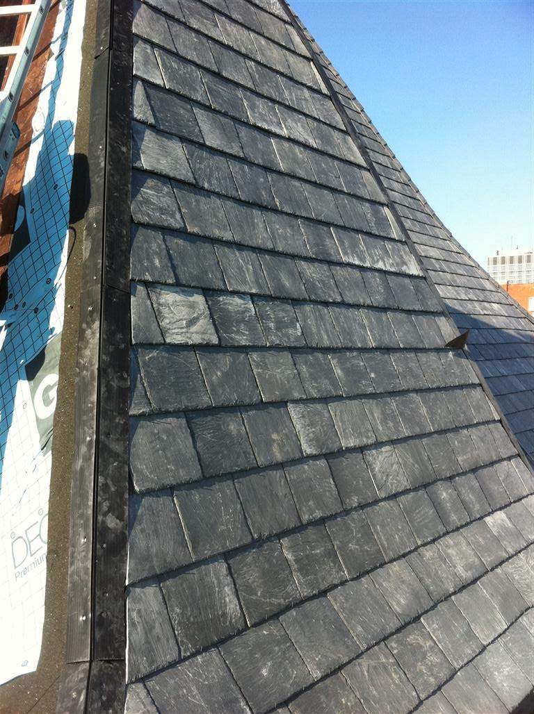 Historic Building ROOF REPLACEMNT with GAF TruSlate  on steep slop and Versico 60mil TPO on flat roof by Gorilla Exteriors Contracting, LLC