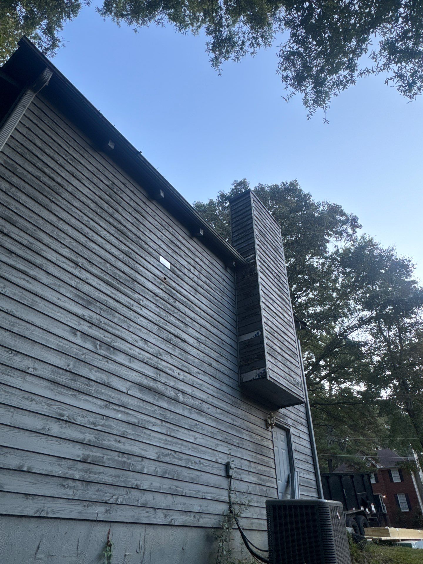 Chimney Chase Siding Replacement and Exterior Painting in Cartersville by Swift Home Renovations 