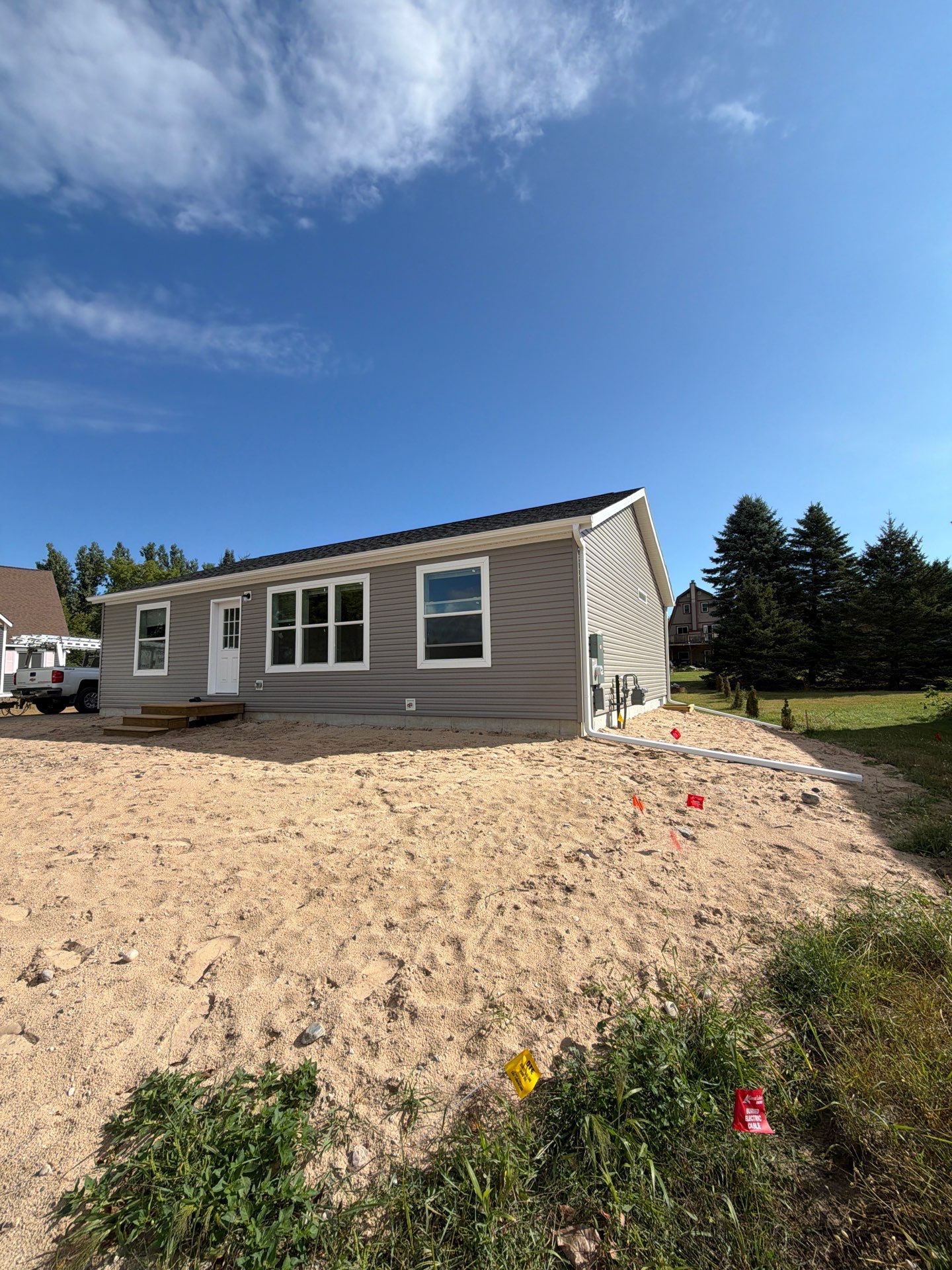 New Gutter System Installation for Boyne Falls Residential Home by Rainbow Seamless Systems