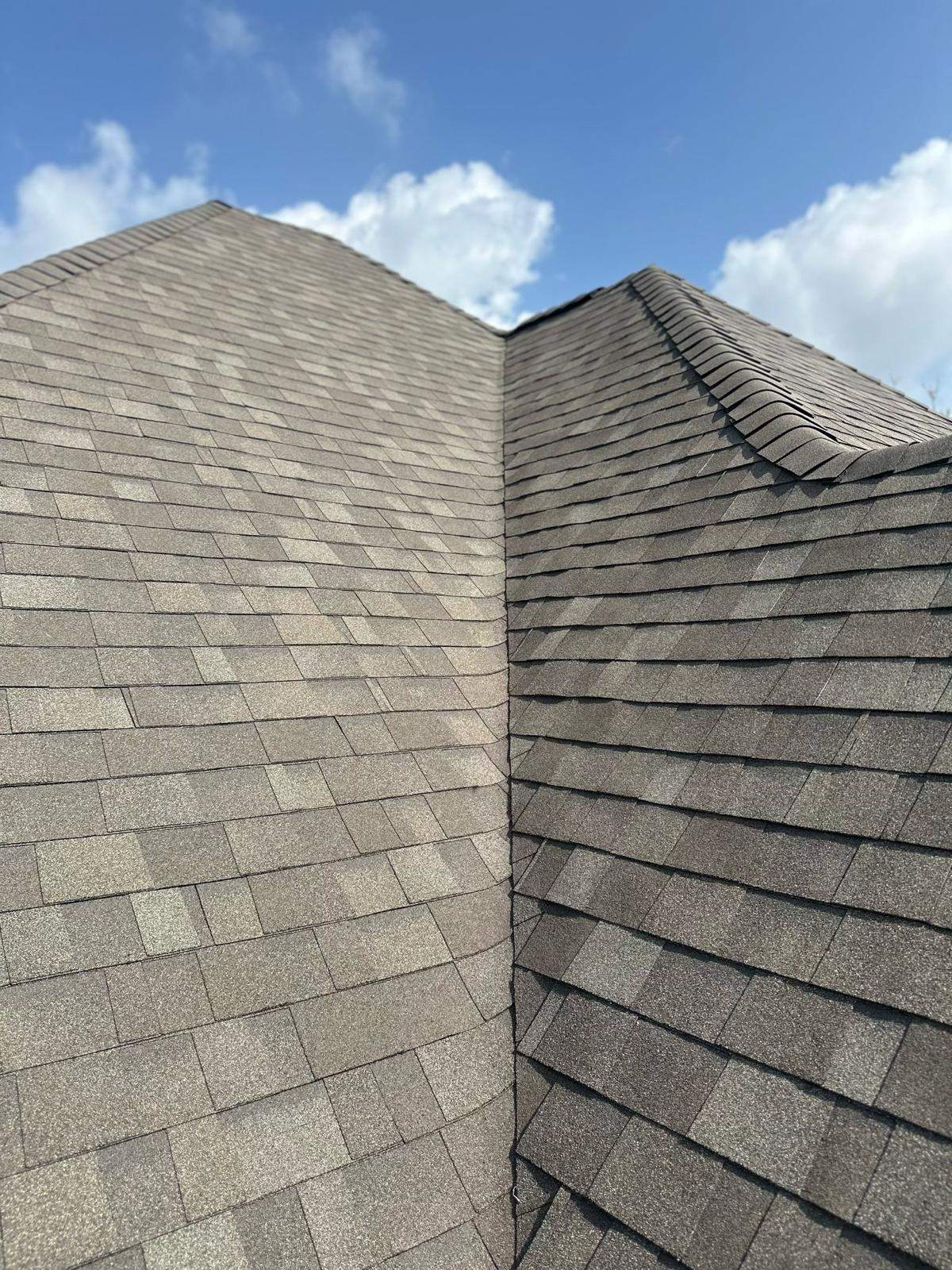 Asphalt Shingle Roof Replacement and Storm Damage Restoration in Austin by Caliber Restoration LLC