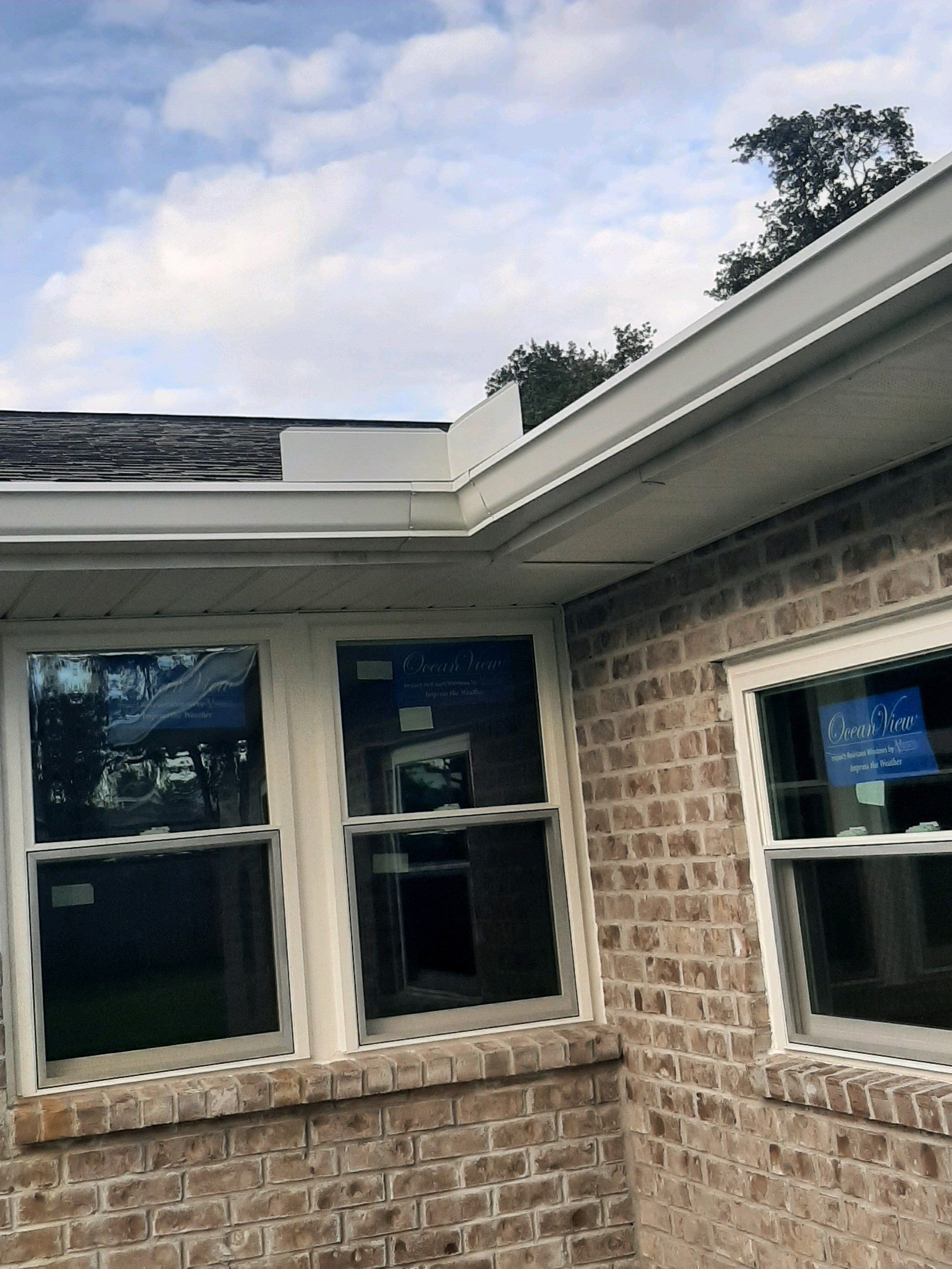 Seamless Gutter Installation using White K-Style Gutters by Gutter Professors