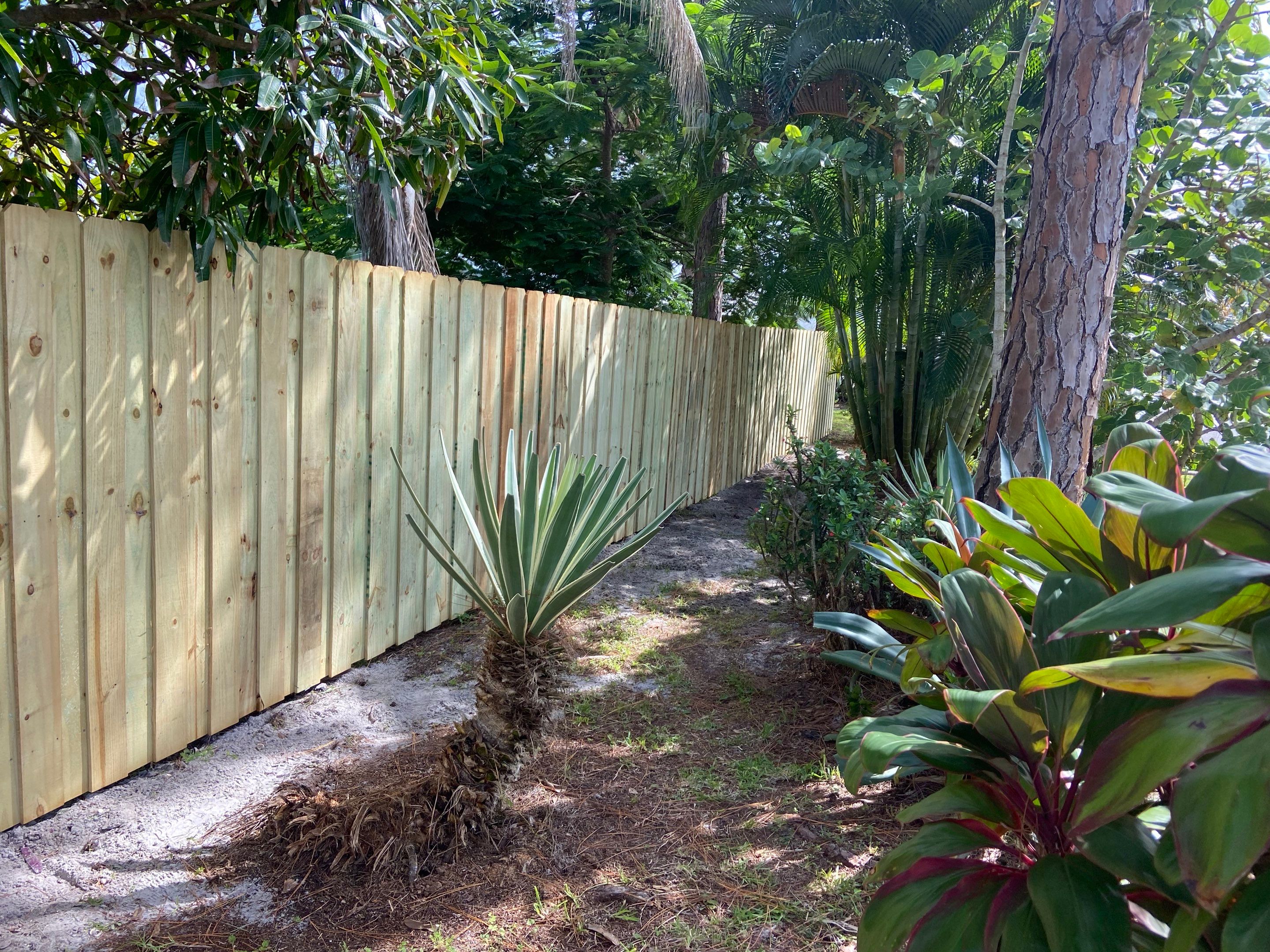 Wood Fence Installation using Board on Board Wood Fence by Asap fence and gates, LLC