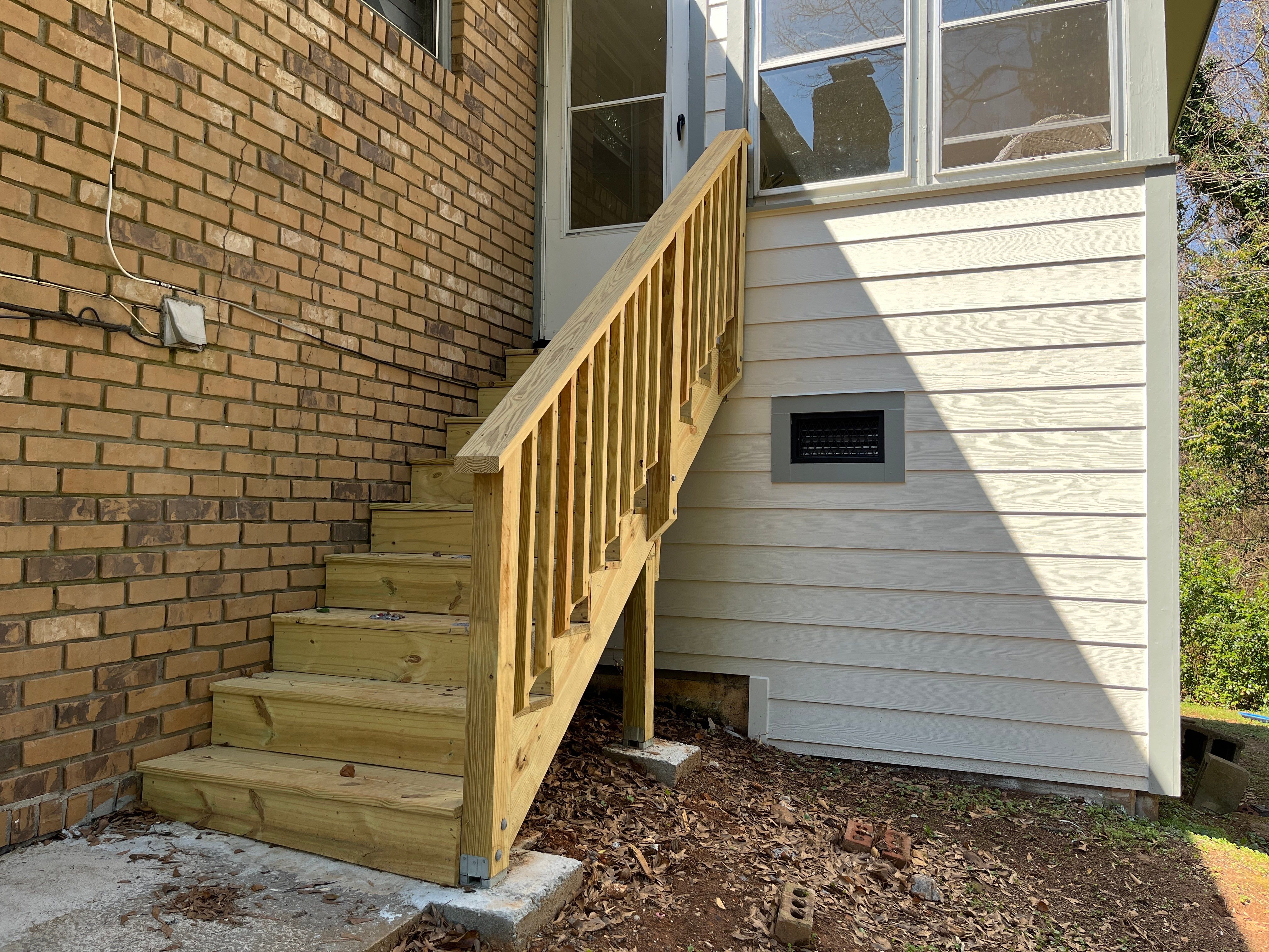 Board and Batten Siding Installation and Railing Replacement in Lilburn, GA by Nelson Exteriors 