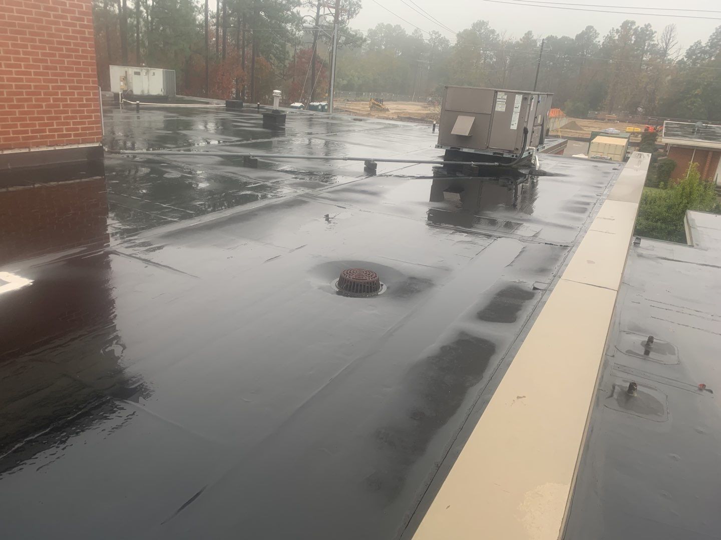 Re Roof (TPO) by American Roofing NC