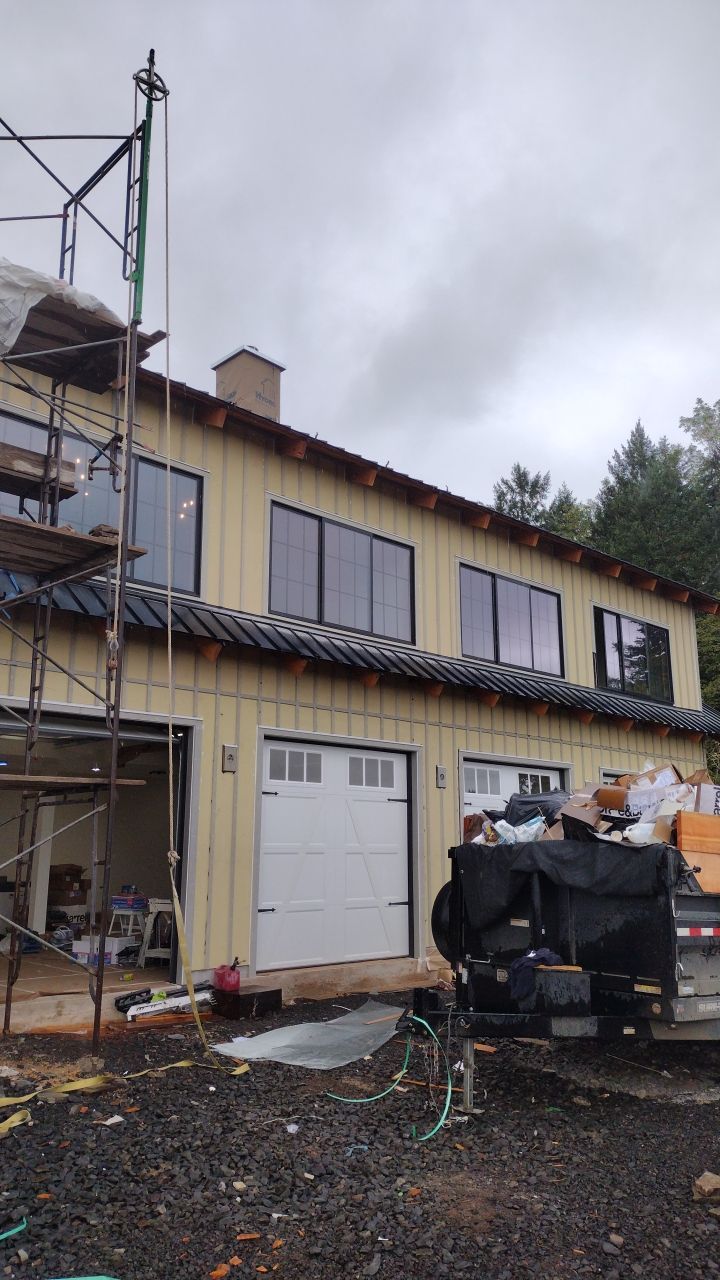 Residential Metal Roof Installation using Taylor Metal Snap Lock Metal Color: Black by Orezona Building & Roofing Company, Inc.