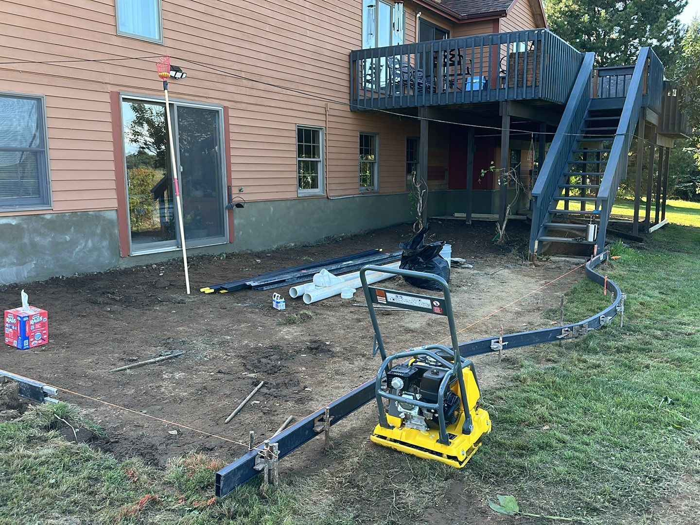 Bluestone textured concrete stamped patio  by NG Masonry & Construction LLC