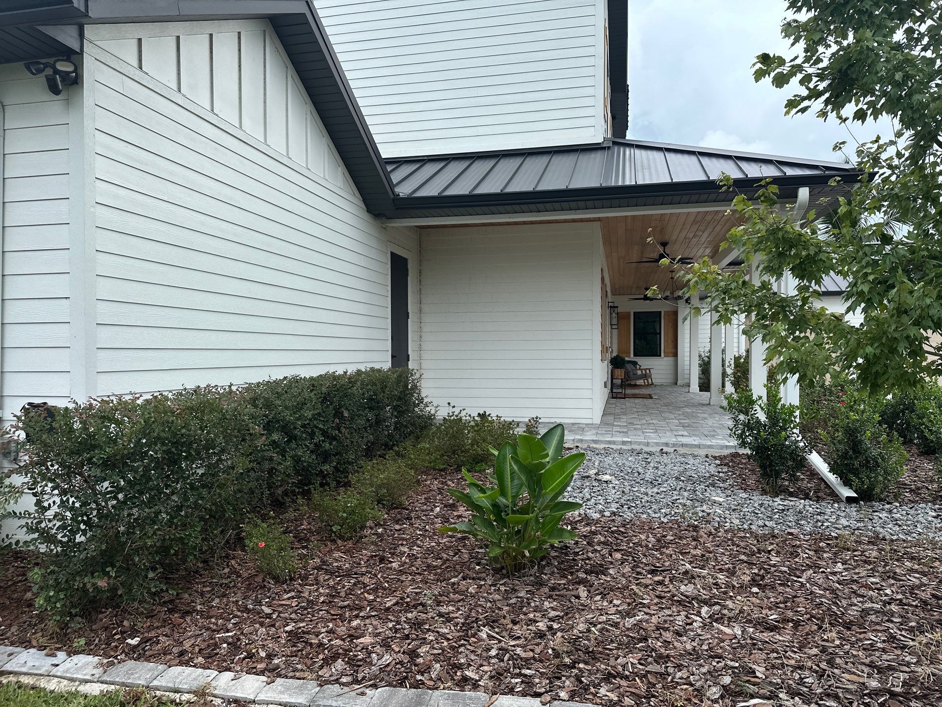 Complete Two-Story House Wash and Driveway Cleaning in Winding River Community, Bradenton, FL by Sunshine AquaWash