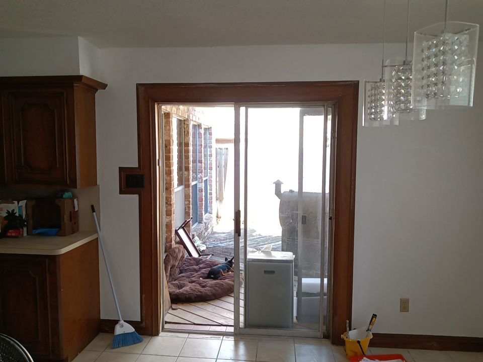 Interior and exterior painting project by Roof Concepts Construction