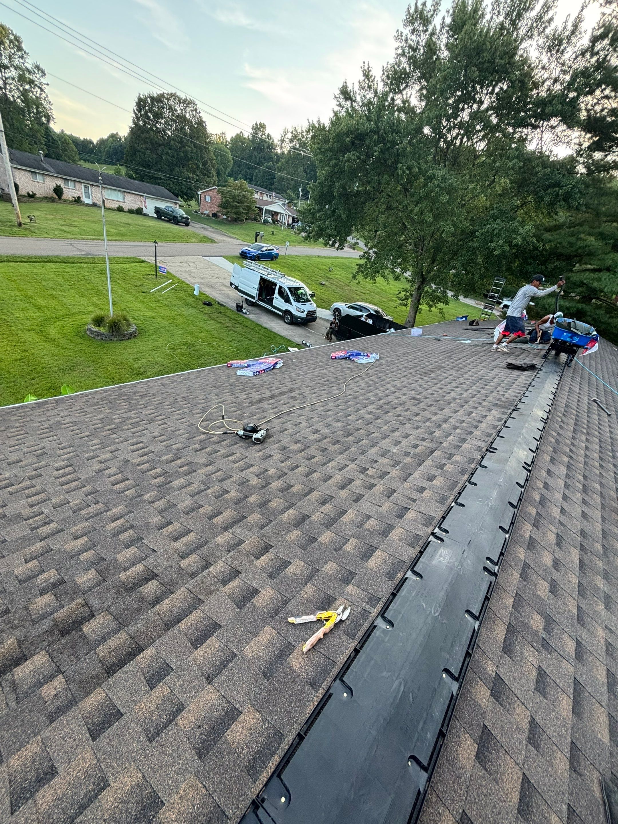 Residential Roofing Installation using GAF Timberline HDZ Charcoal by Rainstoppers Roofing