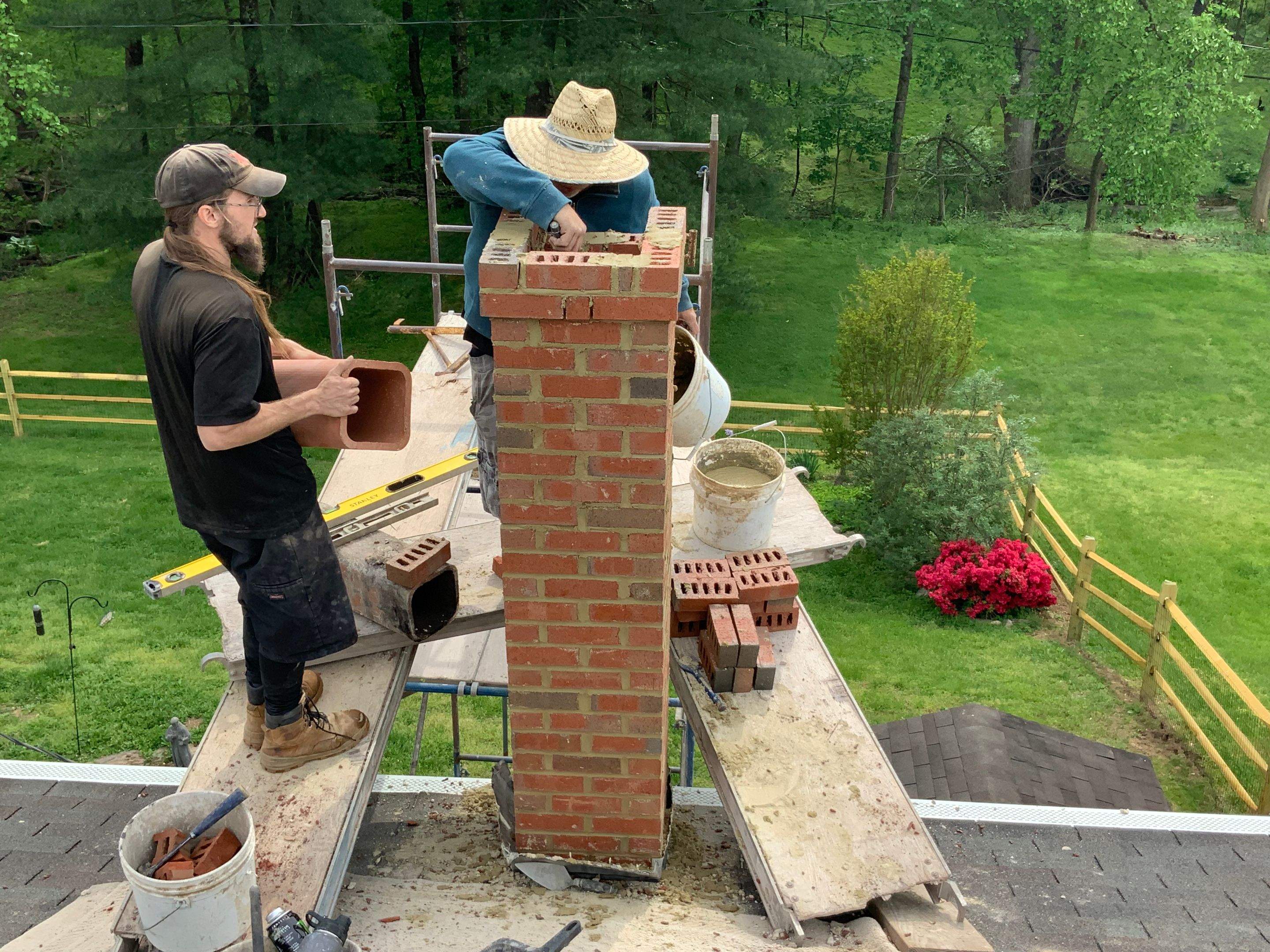 Residential Roofing Installation using Landmark Shingles Color Weatherwood by Alpha Design Services